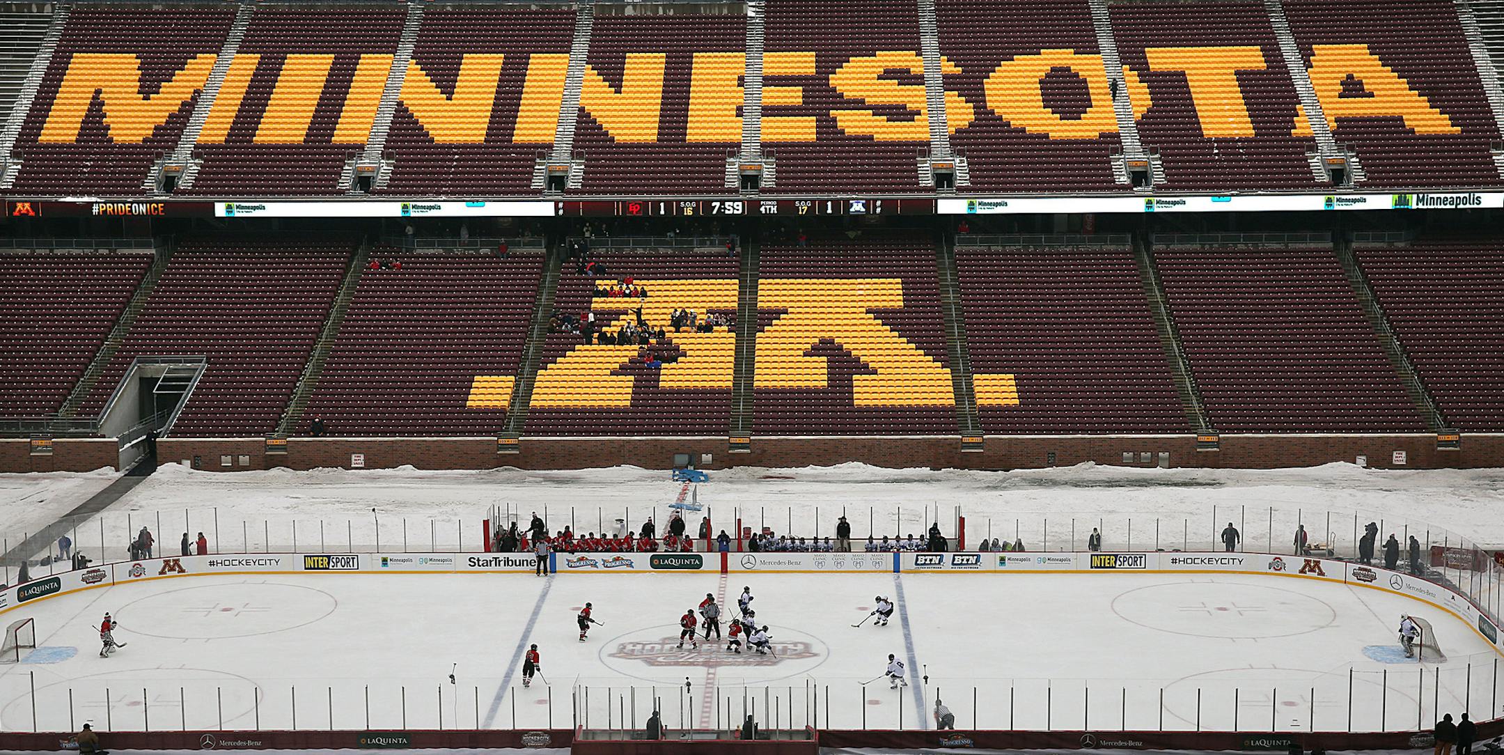Players squared of at center ice for a faceoff to begin the overtime period. ] JIM GEHRZ ‚Ä¢ jgehrz@startribune.com / Minneapolis, MN / January 11, 2014 / 10:00 AM BACKGROUND INFORMATION: The Minnetonka girls‚Äô hockey team played Eden Prairie in an outdoor contest at TCF Bank Stadium at the 2014 High School Hockey Faceoff, January 10, 2014. Minnetonka won the game on an overtime goal by Sydney Baldwin. ORG XMIT: MIN1401111439210911