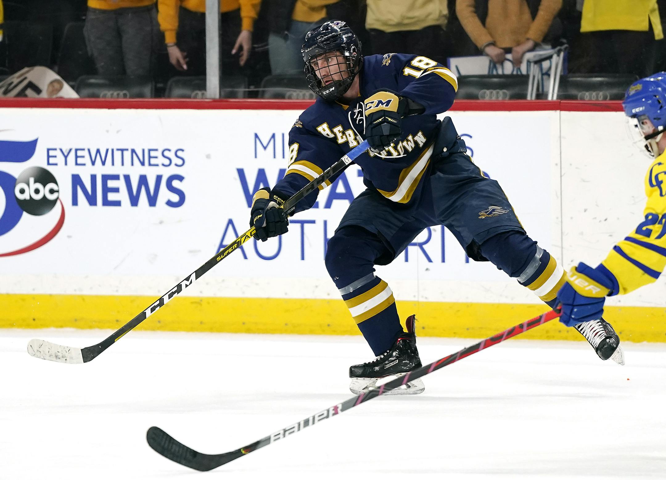 Hermantown defenseman Joey Pierce passed the puck during the second period. ] LEILA NAVIDI &#x2022; leila.navidi@startribune.com BACKGROUND INFORMATION: St. Cloud Cathedral South High School played against Hermantown High School in the 1A boys' hockey state semifinal at Xcel Energy Center in St. Paul on Friday, March 6, 2020.