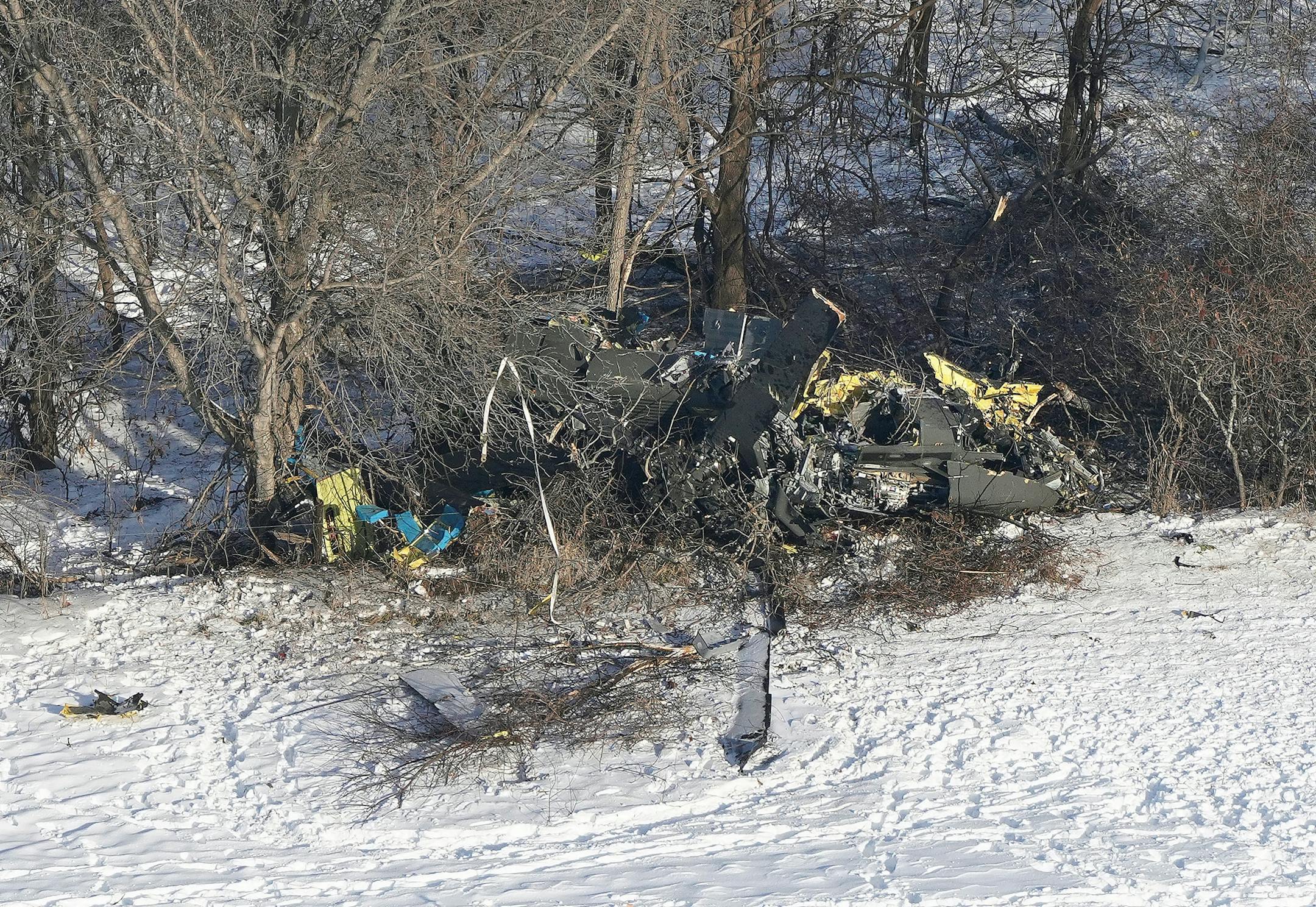 The crash site of a Minnesota National Guard Black Hawk helicopter that killed three service members Thursday afternoon was found in the trees on the edge of a farm field southwest of Marty, Minn.