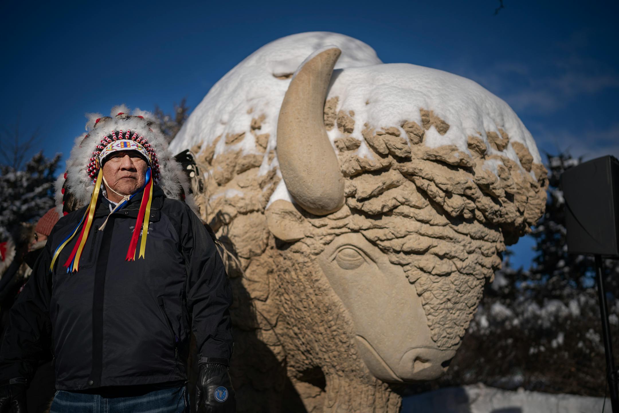 Richard Milda, of Prior Lake, stood next to the White Buffalo sculpture at Reconciliation Park.