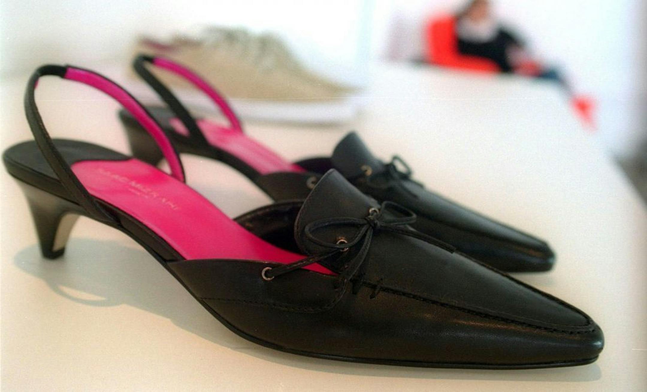 Pair of low healed sling back shoes with a tassel, $29.99. Isaac Mizrahi unvailed his exclusive collection of women's sportswear for Target in Manhattan today. The collection, named Isaac Mizrahi for Target, will be available exclusively in all Target stores nationwide in August 2003. Prices will range from $9.99 for woven tops to $69.99 for outerwear.