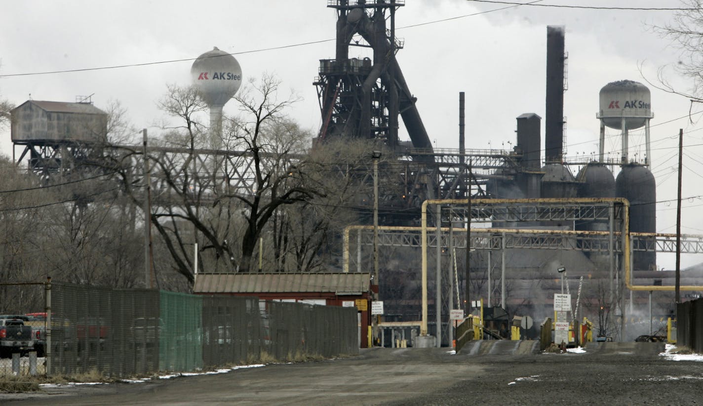 FILE - This Jan. 26, 2009, file photo shows an AK Steel Holding Corp. plant in Middletown, Ohio. Cleveland-Cliffs is buying AK Steel in a stock deal valued at about $1.1 billion. (AP Photo/Al Behrman, File) ORG XMIT: NYBZ276