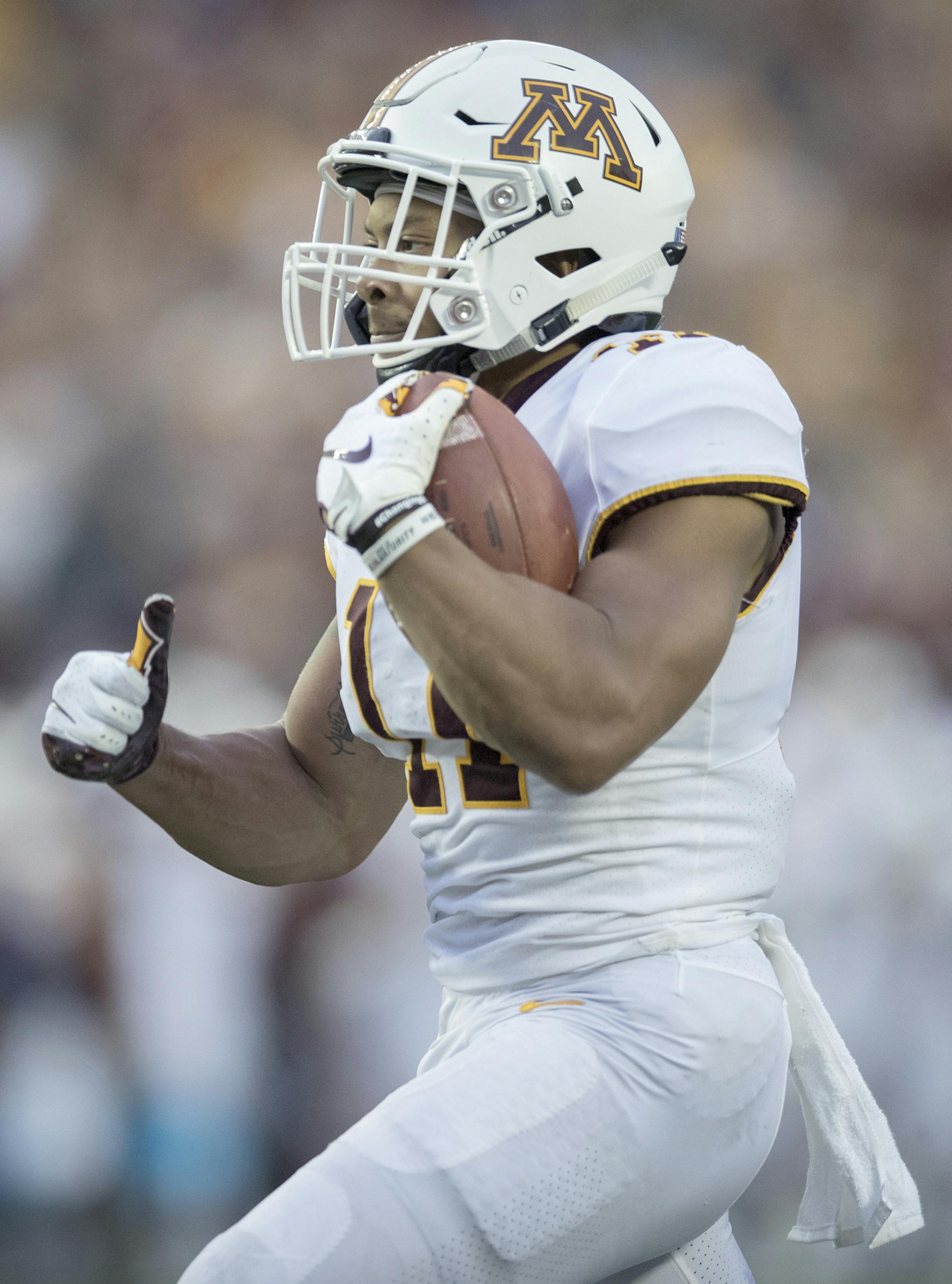 Minnesota's Antoine Winfield Jr. breaks away from the New Mexico State defense to return the ball 76 yards for a touchdown in the second quarter at TCF Bank Stadium in Minneapolis on Thursday, Aug. 30, 2018. (Elizabeth Flores/Minneapolis Star Tribune/TNS)