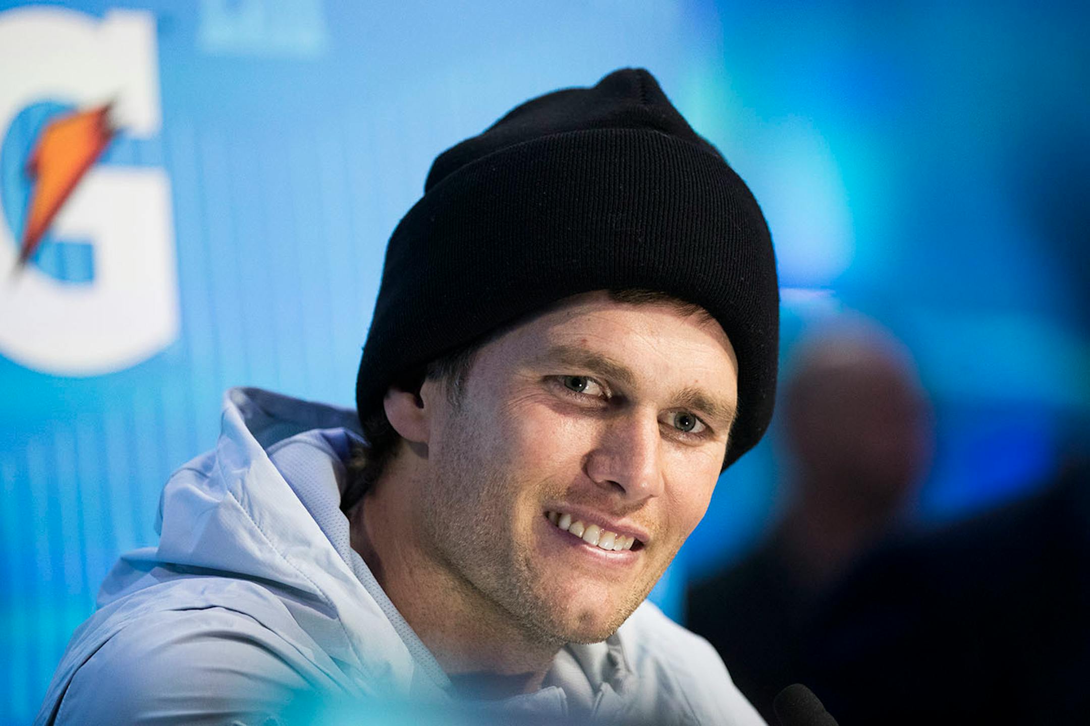 Tom Brady talks to the media.