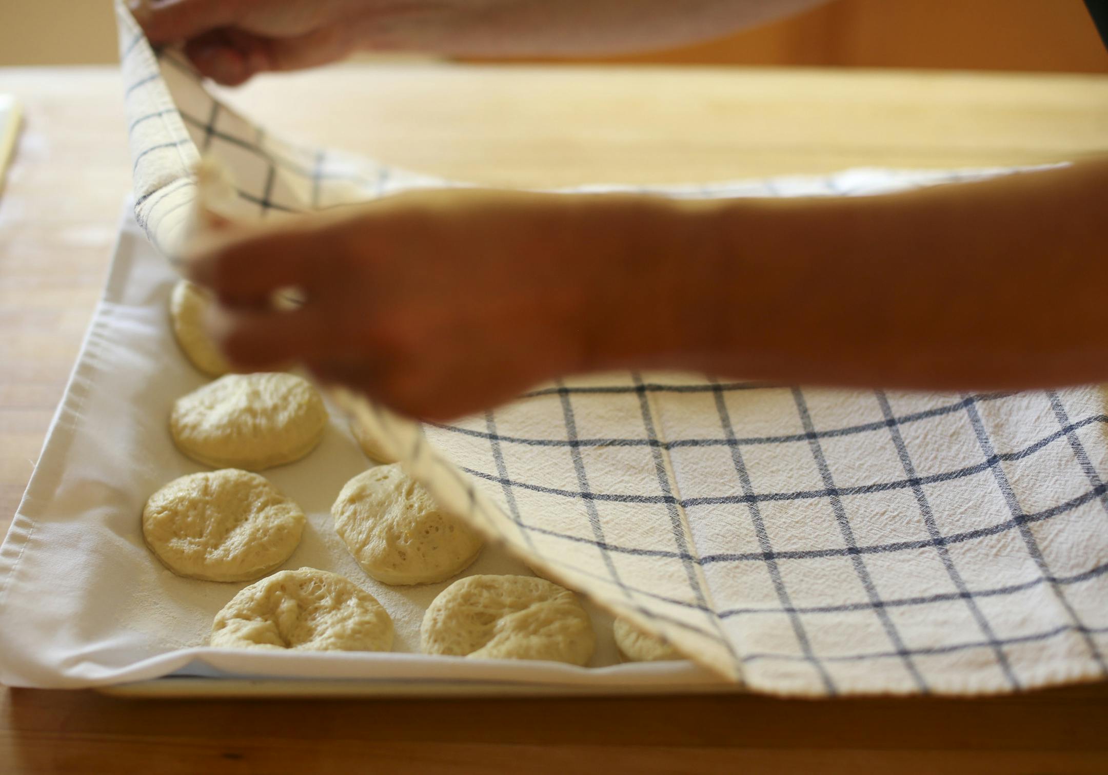 Baking Central takes on krofi, the light and lemony fried pastry from Slovenia. Krofi preparation in Kim Ode's Edina kitchen on Thursday afternoon, October 10, 2013. The krofi are cut out of the dough and then set aside to rise a little bit more. ] JEFF WHEELER ‚Ä¢ jeff.wheeler@startribune.com