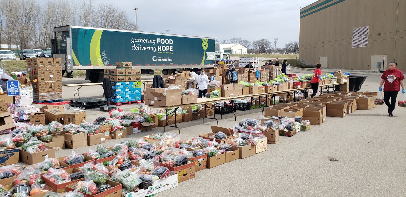 Hundreds of people showed up Wednesday, April 8, 2020 for a free farmers market in Morton, Minn. The fresh produce was donated by the Twin Cities-based food bank, Second Harvest Heartland, in partnership with St. Cornelia's Church and the Lower Sioux Indian Community.