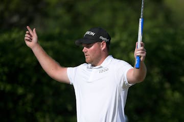 Grayson Murray celebrates after making a putt for birdie on the 14th green during the final round of the 2018 Arnold Palmer Invitational.