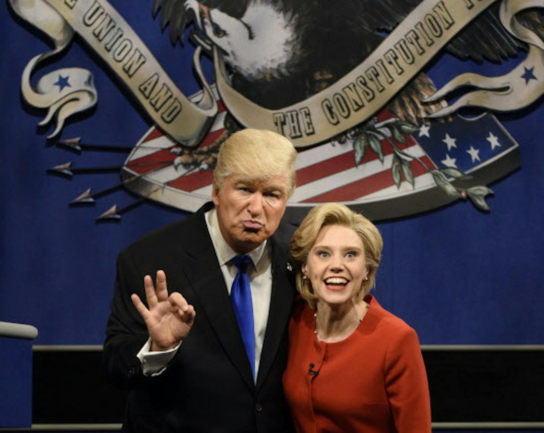 In this photo provided by NBC, Alec Baldwin, left, as Republican presidential candidate, Donald Trump, and Kate McKinnon, as Democratic presidential candidate, Hillary Clinton, perform during the "Debate Cold Open" sketch on the 42nd season of "Saturday Night Live," in New York, Saturday, Oct. 1, 2016. (Will Heath/NBC via AP) MANDATORY CREDIT