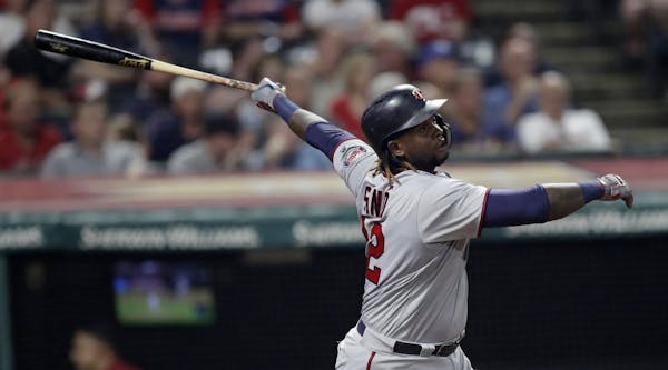 Minnesota Twins' Miguel Sano watches his solo home run during the ninth inning of a baseball game against the Cleveland Indians, Wednesday, Aug. 8, 20