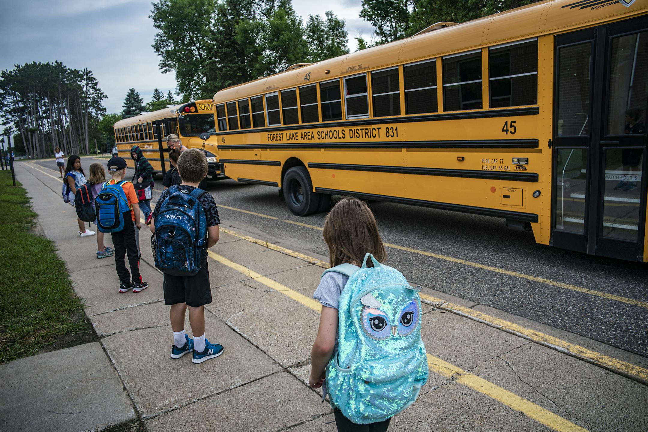 Children arrive for classes at Forest View Elementary where social distancing is enforced.] Kids are back to school! Sort of. In what could be a preview of things to come this fall, a small number of Minnesota school districts and charter schools are using a "hybrid" instruction model, with students at school at least some of the week and distance learning the rest of the time. There are strict rules (including only nine students allowed in a room with one teacher) and 50% capacity limits on bus