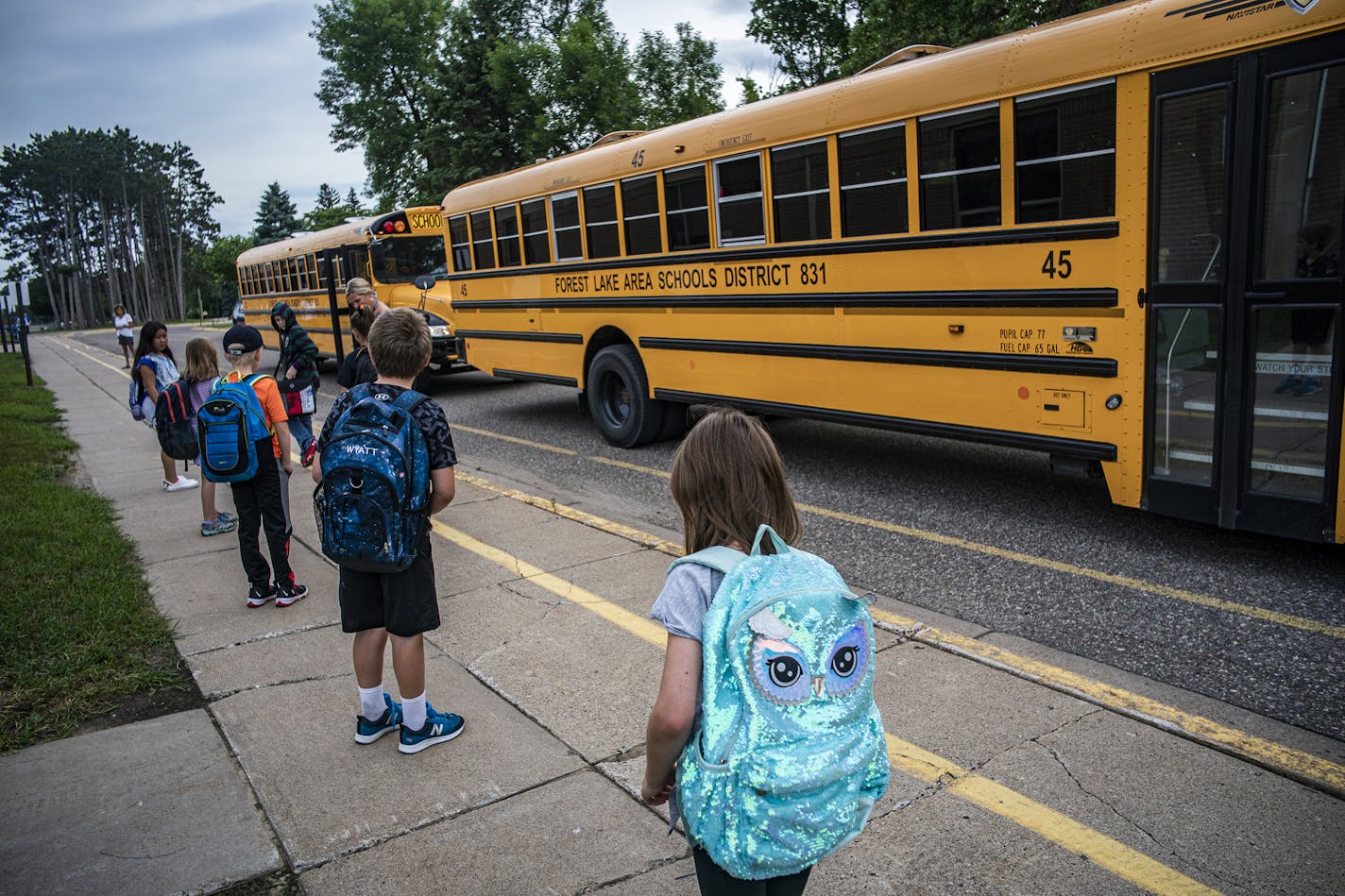 Children arrive for classes at Forest View Elementary where social distancing is enforced.] Kids are back to school! Sort of. In what could be a preview of things to come this fall, a small number of Minnesota school districts and charter schools are using a "hybrid" instruction model, with students at school at least some of the week and distance learning the rest of the time. There are strict rules (including only nine students allowed in a room with one teacher) and 50% capacity limits on bus