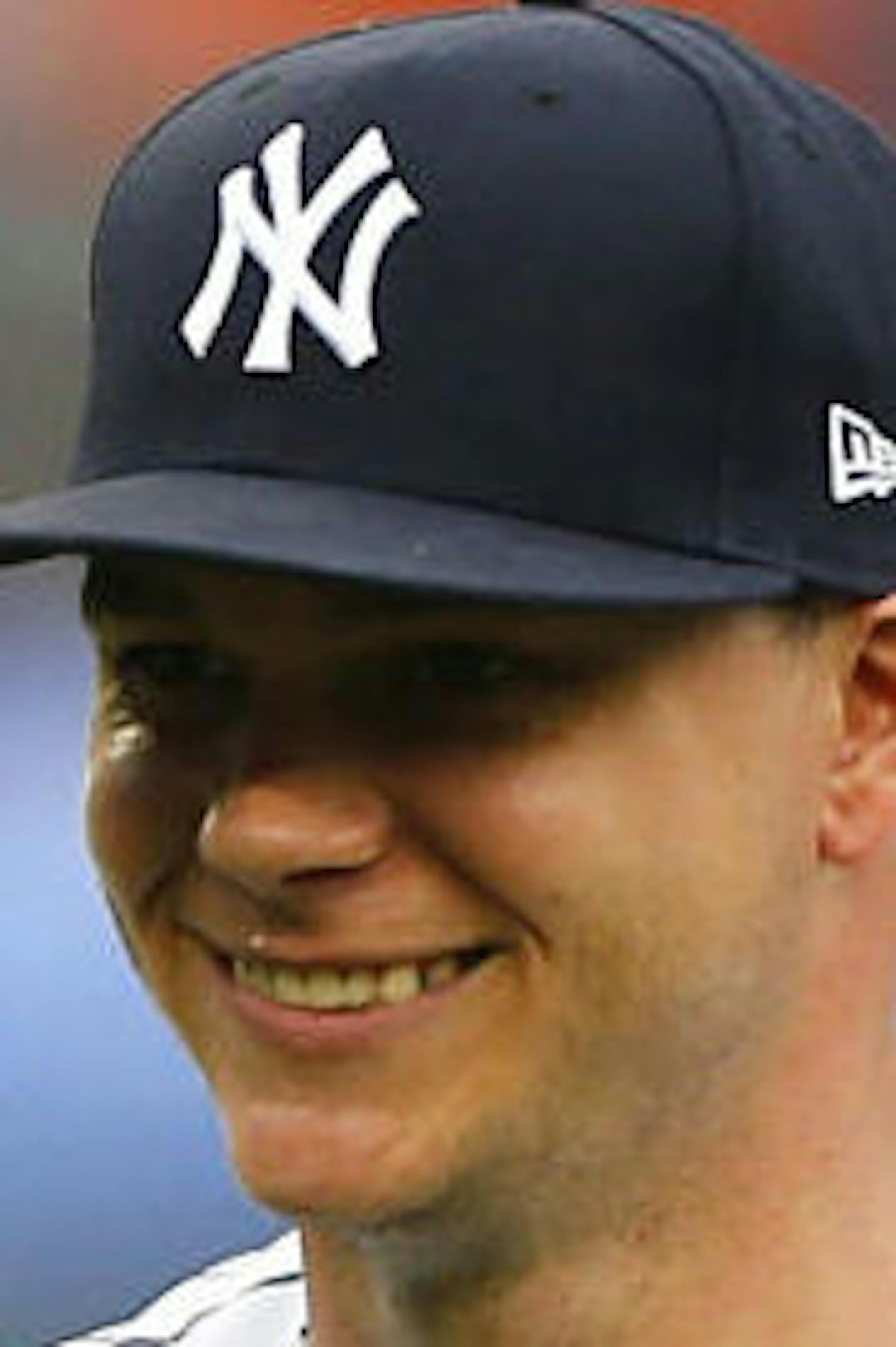 Aug 1, 2018; Bronx, NY, USA; New York Yankees starting pitcher Sonny Gray (55) smiles as he leaves the game in the third inning against the Baltimore Orioles at Yankee Stadium. Mandatory Credit: Noah K. Murray-USA TODAY Sports ORG XMIT: USATSI-376278
