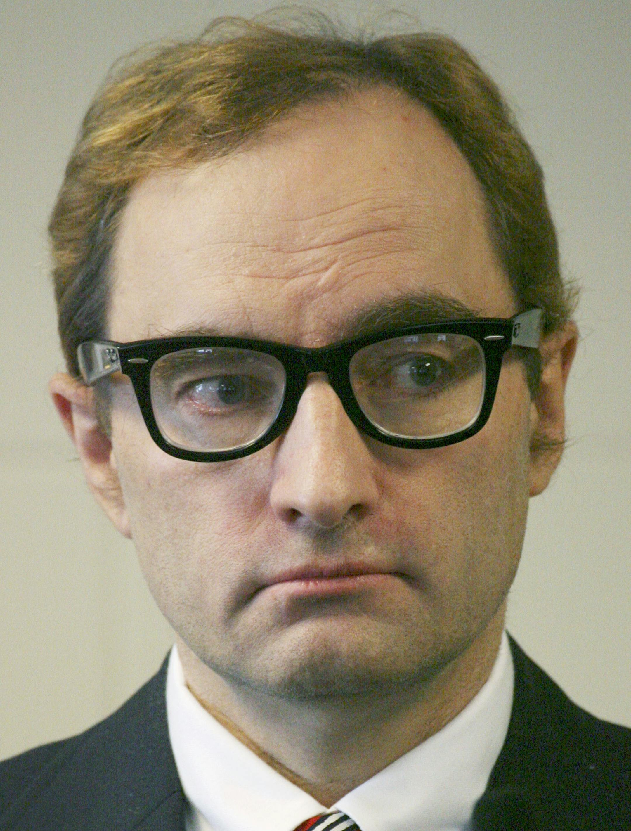 The man who calls himself Clark Rockefeller is seen during his arraignment on kidnapping charges Monday, Sept. 29, 2008 at Suffolk Superior Court in Boston, Ma. A judge set bail at $50 million cash for the man investigators say is really Christian Karl Gerhartsreiter. (AP Photo/Mike Adaskaveg, pool) ORG XMIT: MABOH101