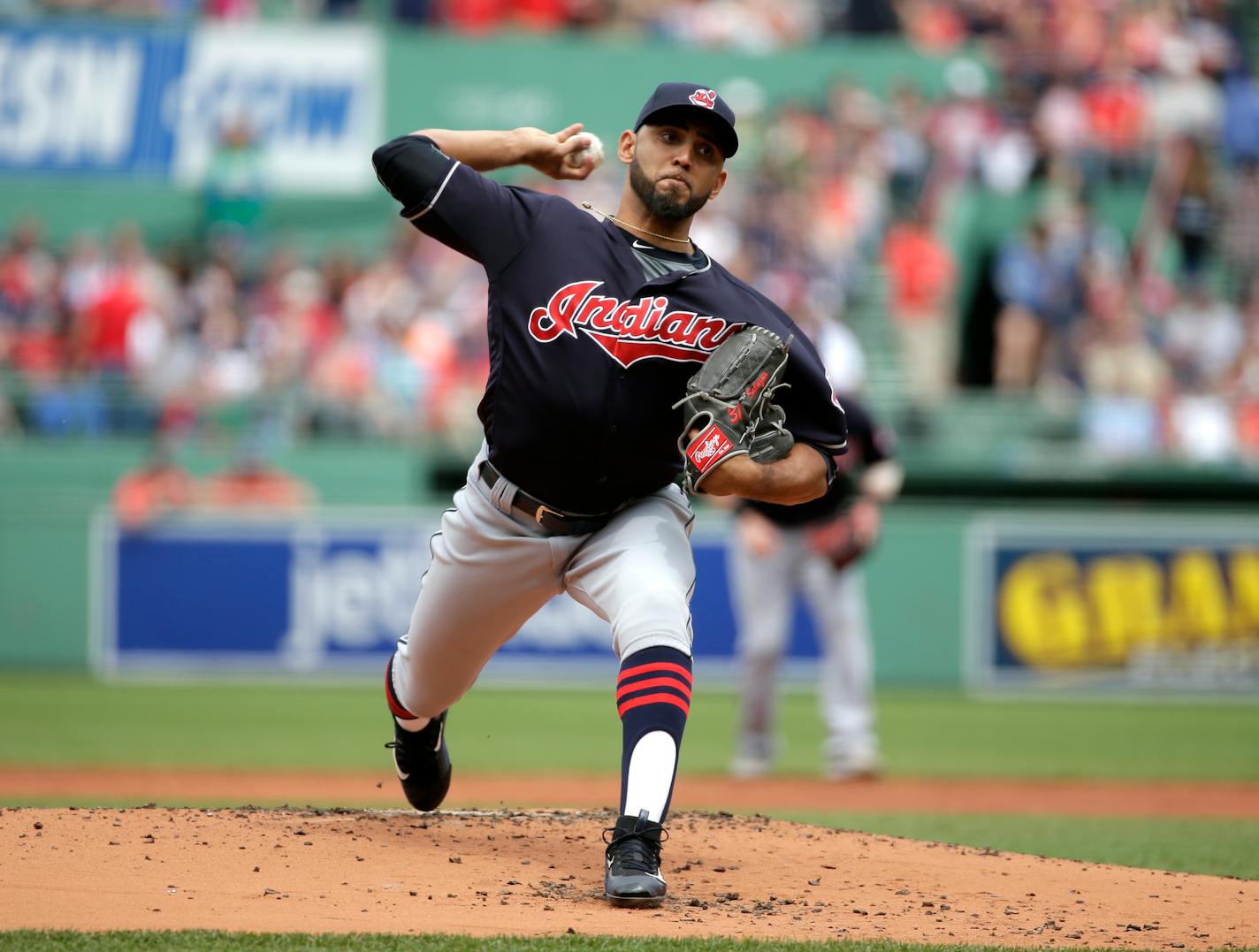 Cleveland Indians' Danny Salazar delivers a pitch against the Boston Red Sox in the first inning of a baseball game at Fenway Park, Sunday, May 22, 2016, in Boston. (AP Photo/Steven Senne) ORG XMIT: MASR102