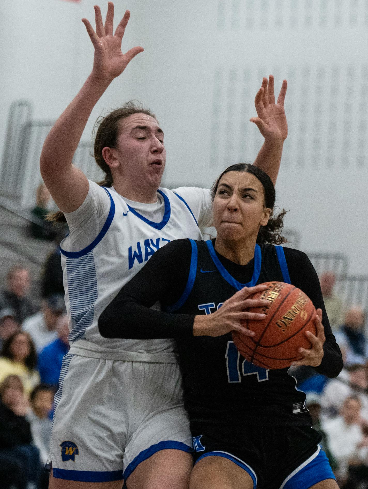 Minnetonka's Victoria McKinney, drives to the basket on Katie Kelzenberg of Wayzata Tuesday January ,10 2024 in, Minnetonka Minn. ] JERRY HOLT • jerry.holt@startribune.com