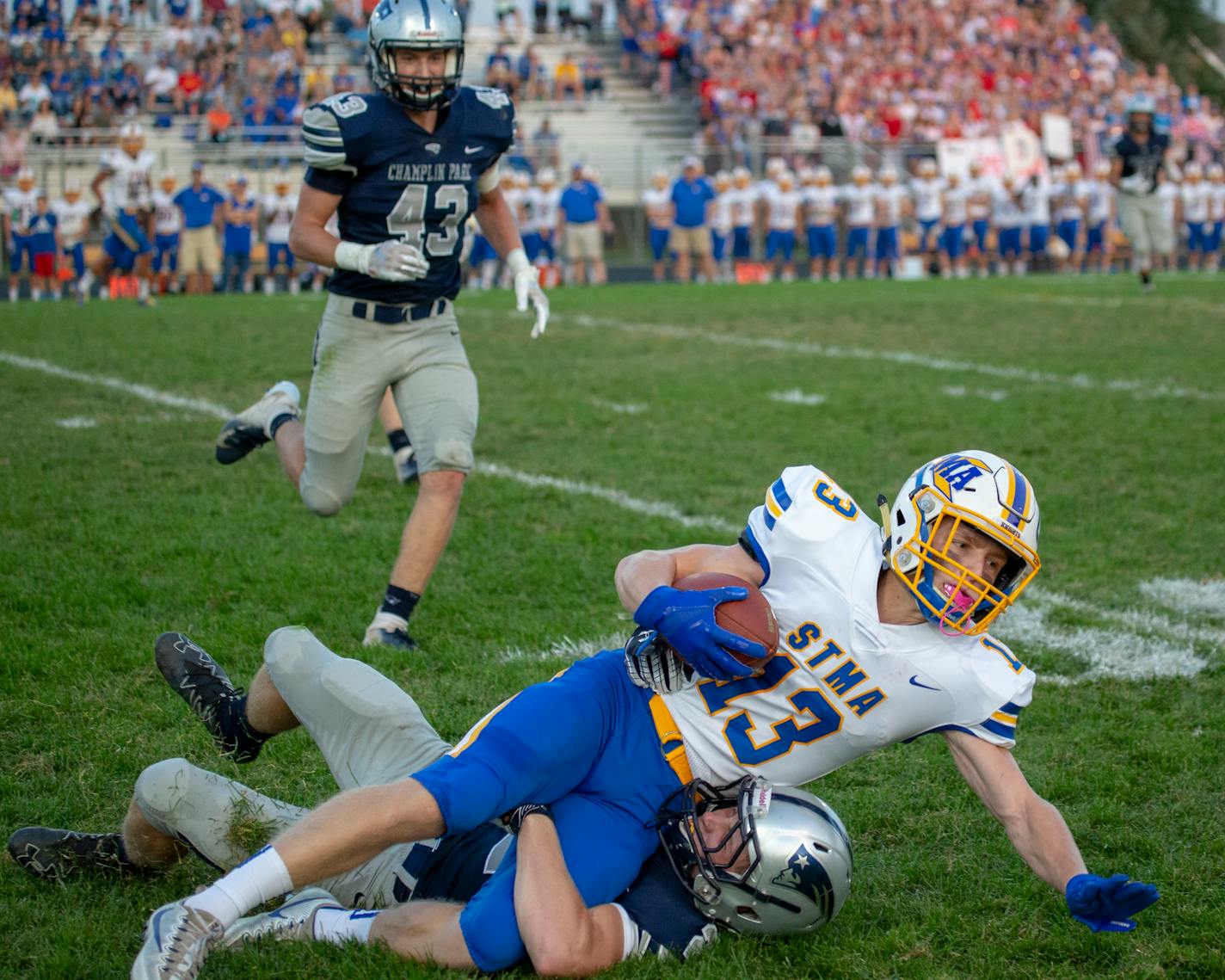 St. Michael-Albertville's Brandon Langdok (shown in a September game against Champlin Park) recovered two of three onside kicks in the fourth quarter, sparking the Knights' wild 29-28 comeback victory over Edina in the second round of the Class 6A football tournament.