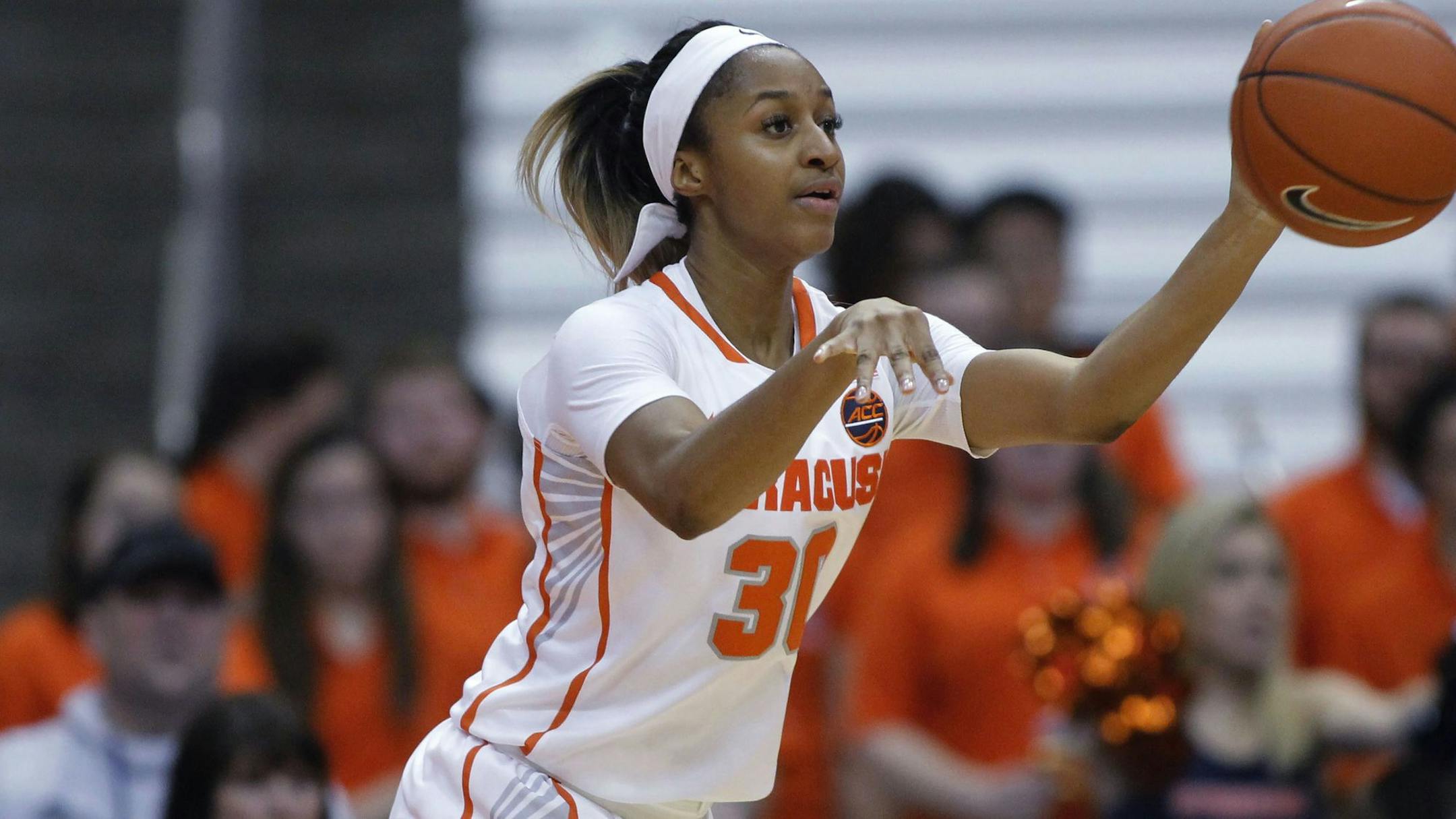 Syracuse's Kadiatou Sissoko passes the ball in the third quarter of an NCAA basketball game against Miami in Syracuse, N.Y., Wednesday, Jan. 23, 2019. Miami won 84-71. (AP Photo/Nick Lisi) ORG XMIT: NYOTK