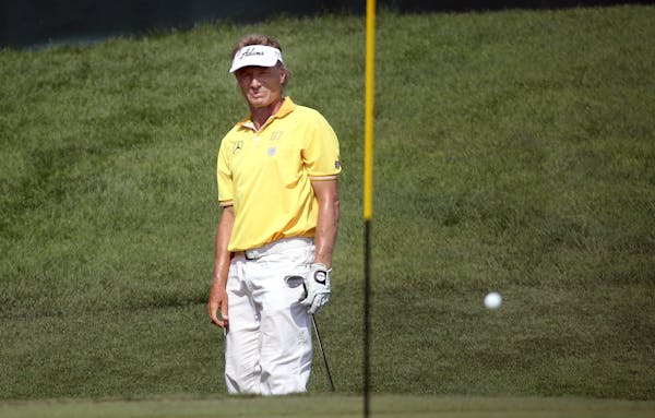Bernhard Langer chipped from the rough on the 18th.] JIM GEHRZ � james.gehrz@startribune.com / Blaine, MN / August 1, 2015 / 11:00 AM � BACKGROUND