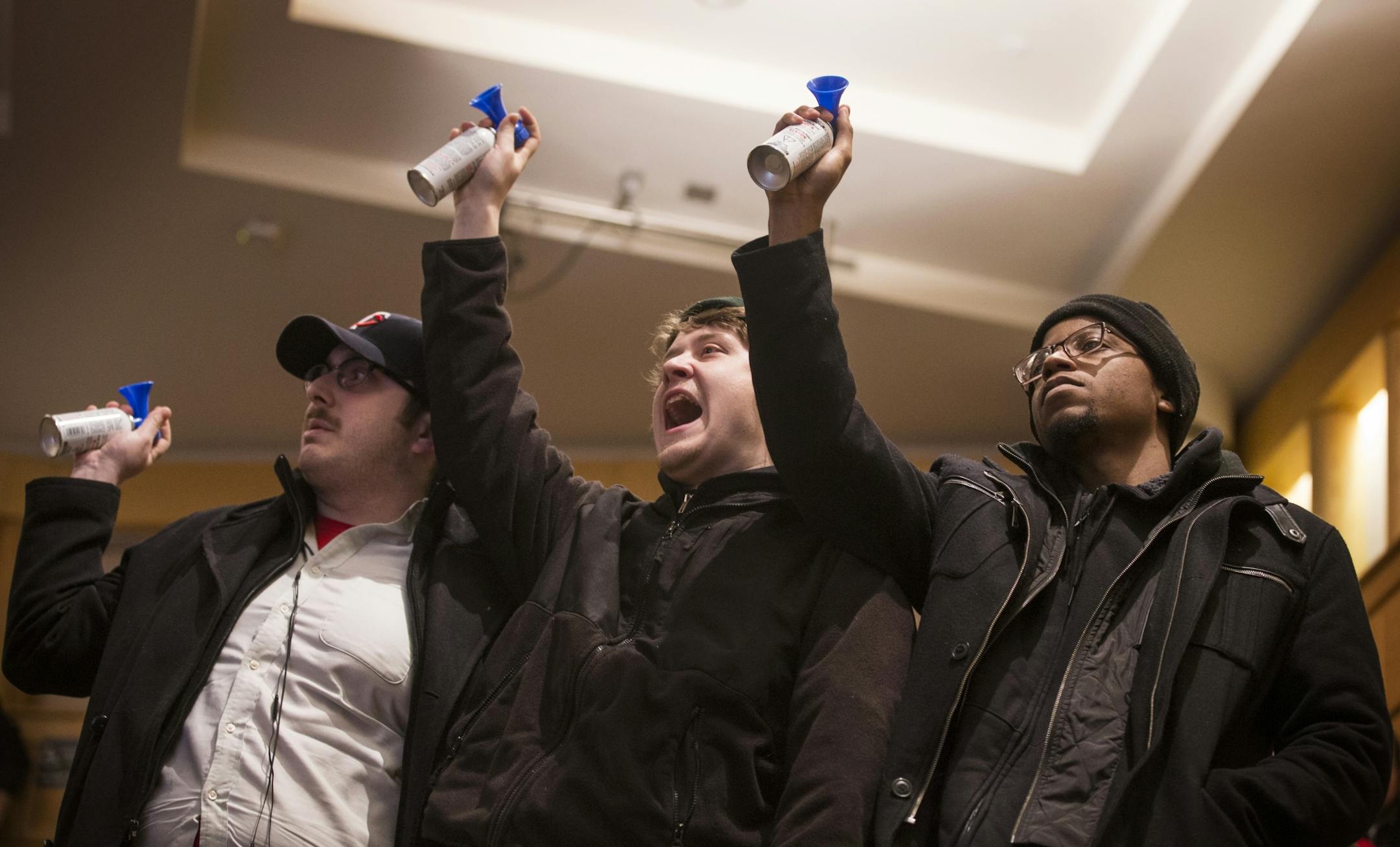 Protesters interrupt with blow horns and chanting "a**hole" during a talk by Milo Yiannopoulos and Christina Hoff Sommers at the Humphrey Institute of Public Affairs on the campus of the University of Minnesota in Minneapolis on Wednesday, February 17, 2016. The protesters were escorted out by security.