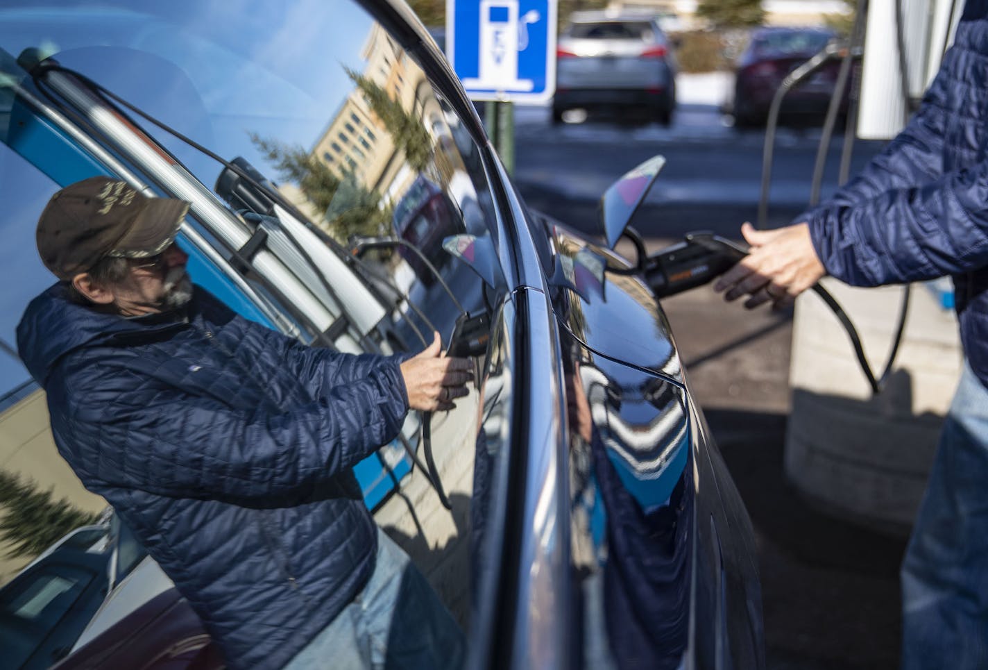 George Host charged his Tesla at the ChargePoint e-vehicle station near Canal Park Lodge in Duluth.