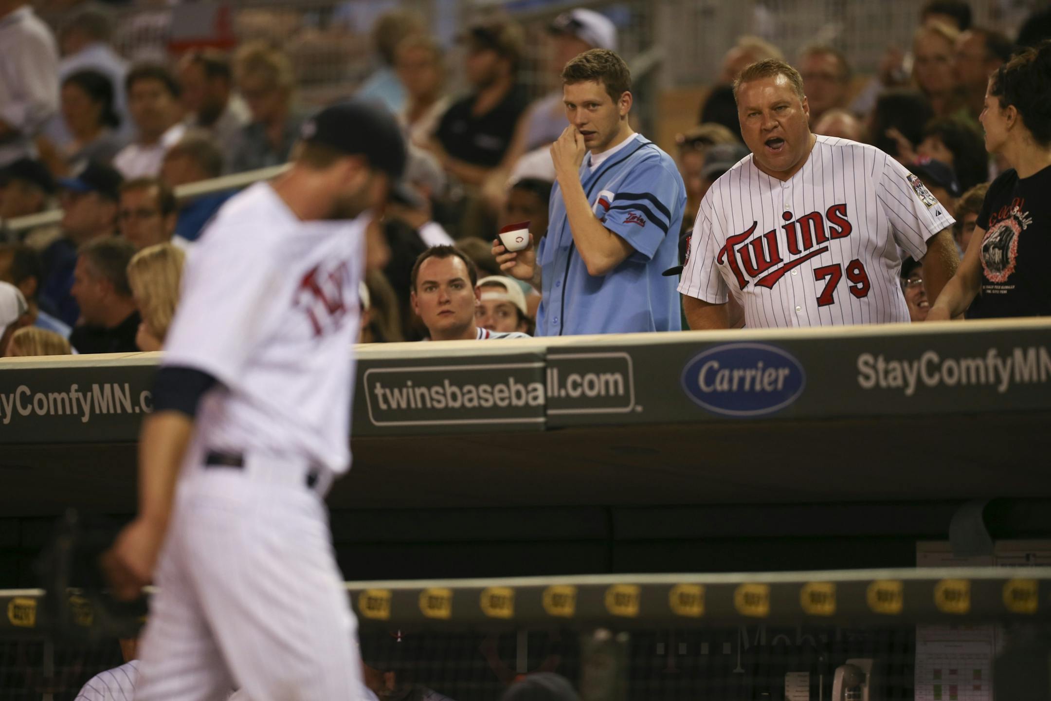 Twins reliever Jared Burton left the field displeased with his performance — and the feeling among Target Field fans appeared to be mutual — after giving up two runs and three hits and committing a run-scoring throwing error in the eighth inning against the New York Yankees on Monday night.