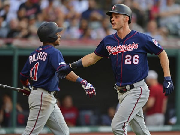 Max Kepler is greeted by Jorge Polanco after hitting his fifth home run in five at-bats against pitcher Trevor Bauer last season.