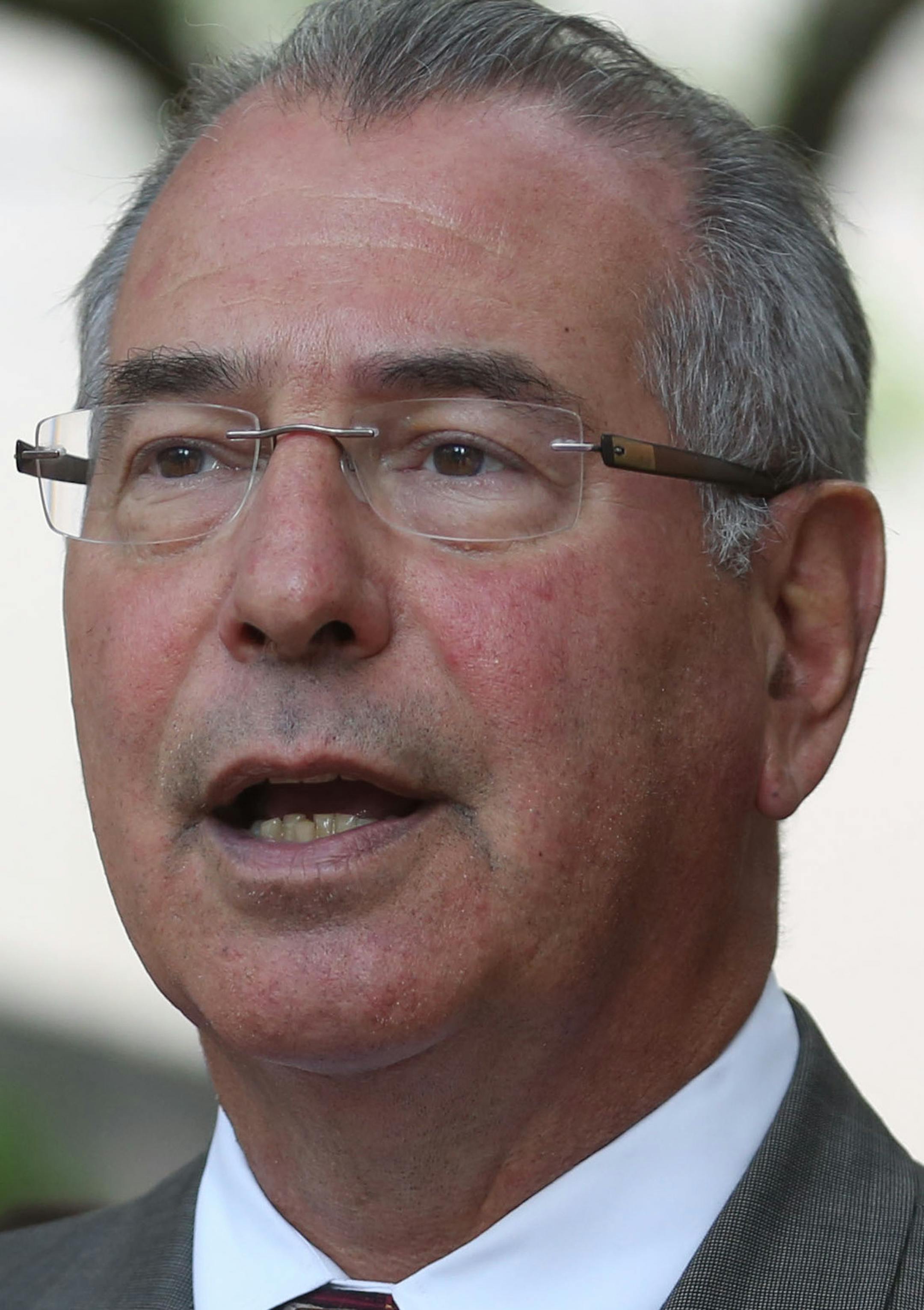 Hennepin County Attorney Mike Freeman answered questions during the press conference. ] (KYNDELL HARKNESS/STAR TRIBUNE) kyndell.harkness@startribune.com Hennepin County attorney's office to announce charges in cold case involving double homicide, of Carrie Ritcher and Dustin Baity in Minneapolis at the south end of the Hennepin County Government Center in Minneapolis, Min. Wednesday, July 9, 2014.