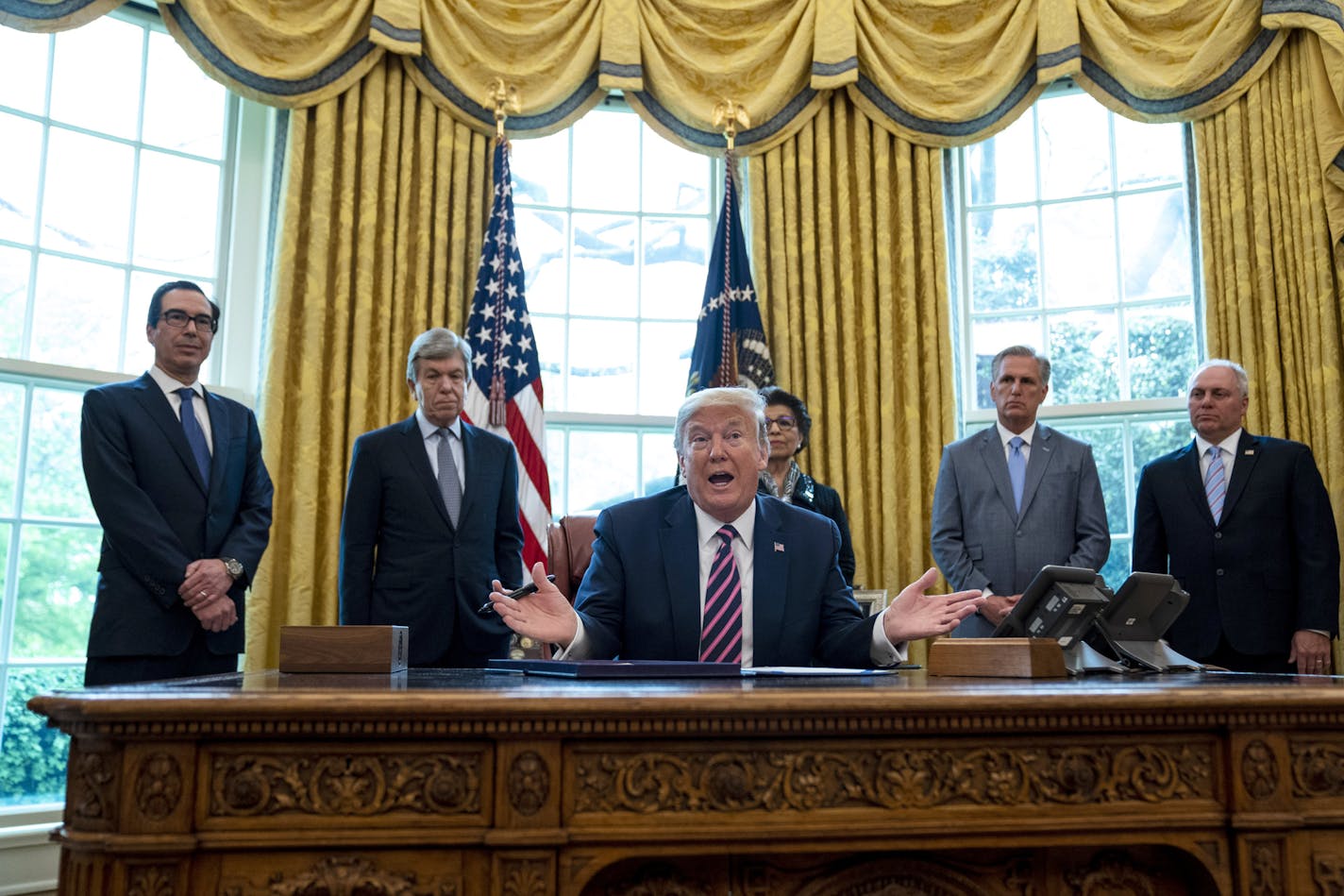 FILE — President Donald Trump speaks after signing the Paycheck Protection Program and Health Care Enhancement Act in the Oval Office on April 24, 2020. . (Anna Moneymaker/The New York Times) ORG XMIT: MER7d74ece4746a4814afedc9df56e13