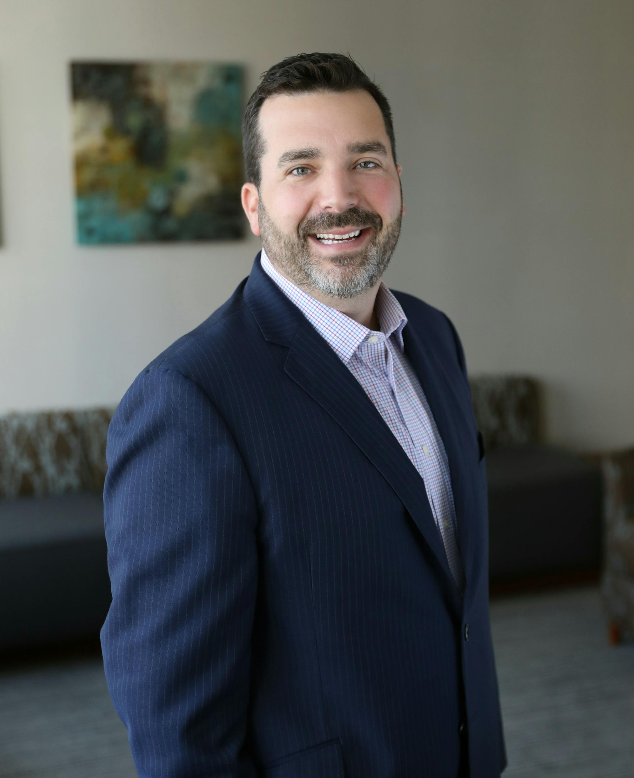 Jim Komoszewski (cq), the new president of AdvisorNet Financial