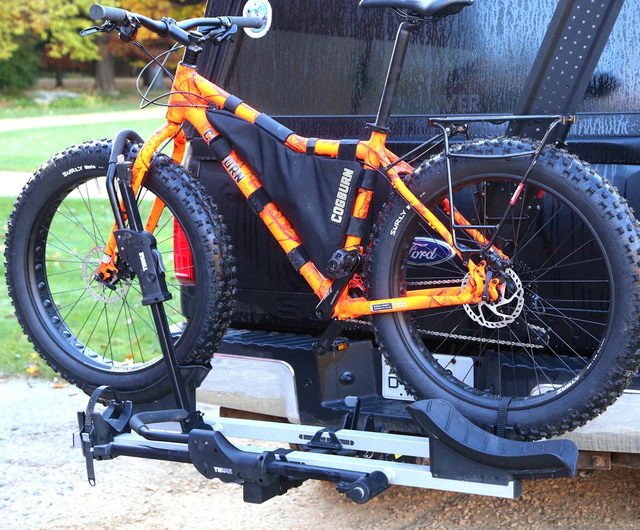A rack that attaches to a receiver hitch allows up to four fat-tire bikes to be carried behind a vehicle, leaving room in the pickup bed for camping and other hunting equipment.