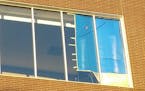This window on the fourth floor of the Minneapolis School District headquarters was shattered by gunfire Monday.