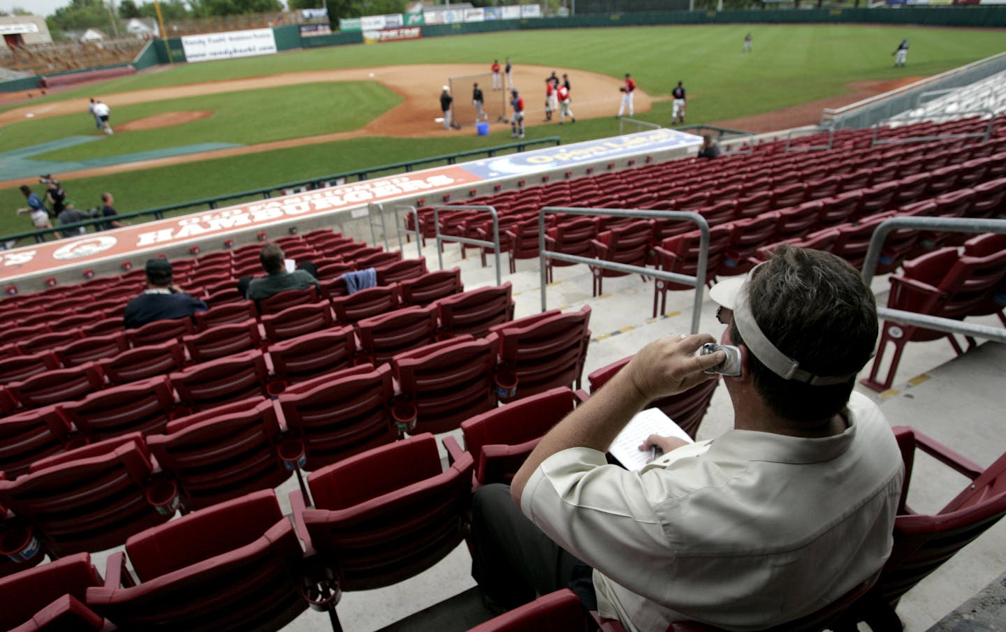 Mike Radcliff, watches players during the 2005 Pre-Draft Showcase put on by Perfect Game at Veterans Memorial Stadium in Cedar Rapids, IA.