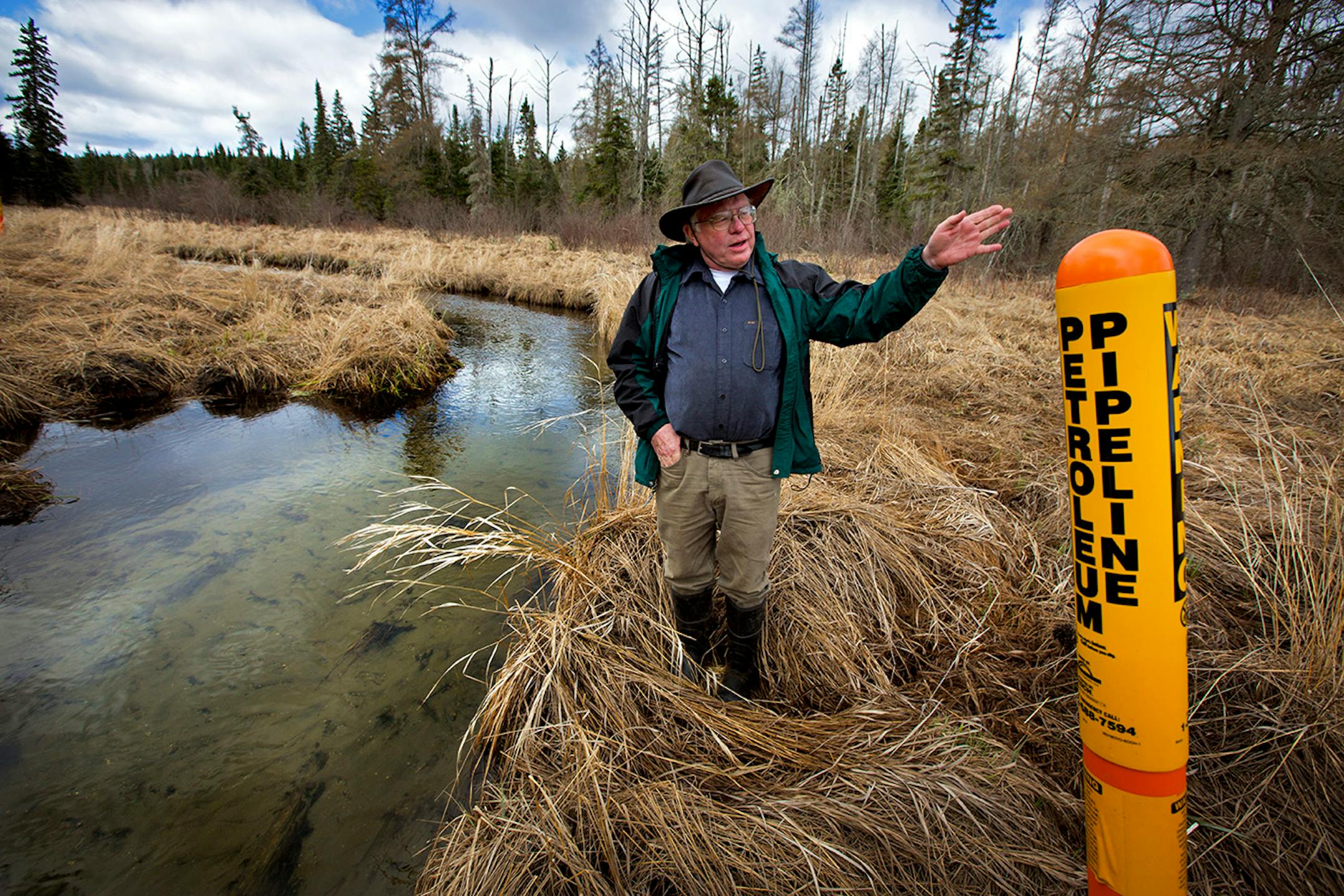 As Enbridge Energy plans another crude oil pipeline through northern Minnesota bog lands, state environmental officials are worried about the risk of another spill in sensitive natural areas, including some that are inaccessible by road. Here, former DNR scientist Paul Stolen shows some of the sensitive wetland areas along La Salle creek north of Itasca State Park. ] BRIAN PETERSON • brian.peterson@startribune.com LaSalle Lake, MN 5/12/2014