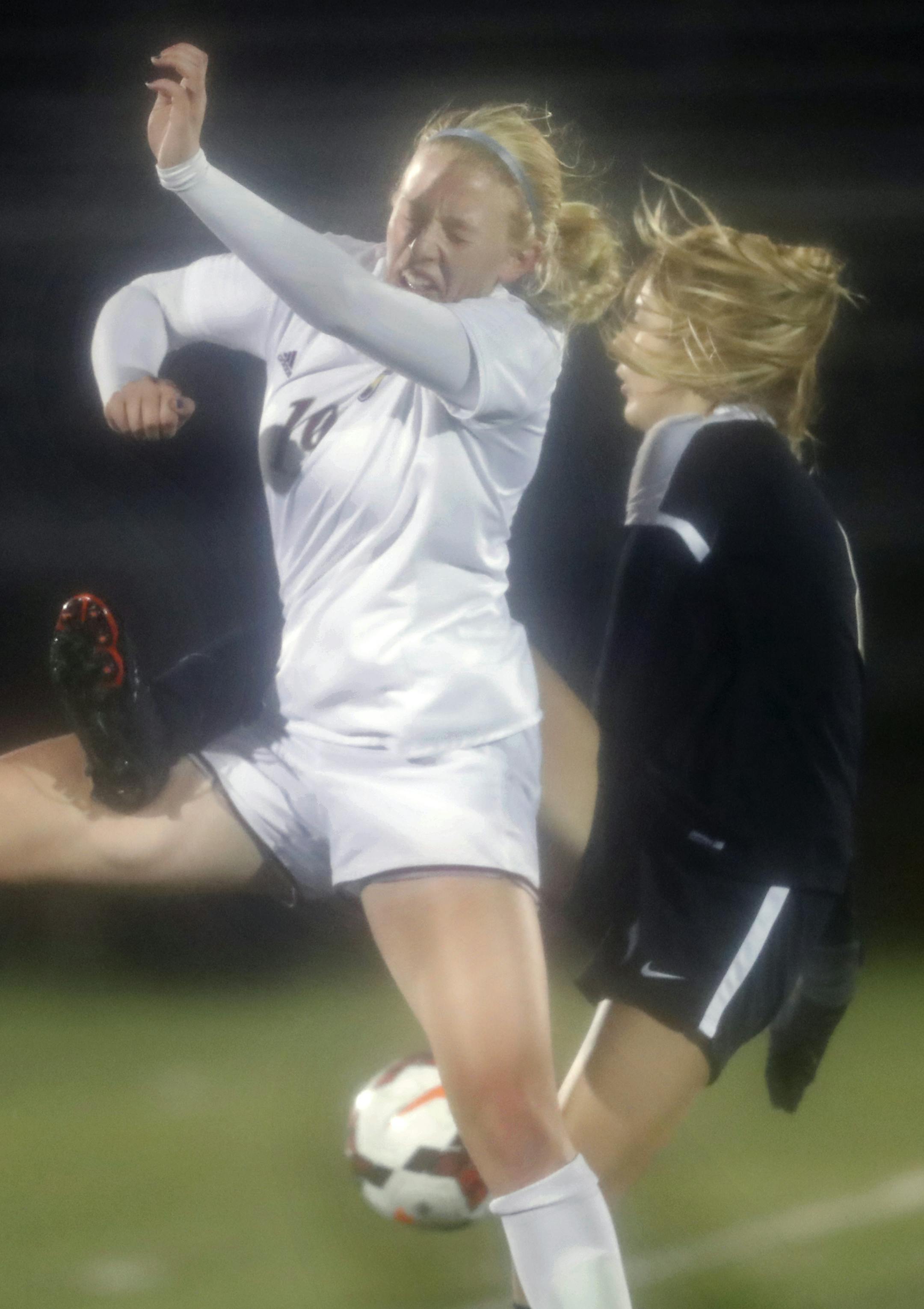 Mannon McManon(19) of Maple Grove and Taylor McGahn(8) clash for the ball. ] Class 2A girls' soccer quarterfinals at Chisago Lakes.Maple Grove and Eastview clash. North,Richard Tsong-Taatarii/Richard.tsong-taatarii@startribune.com