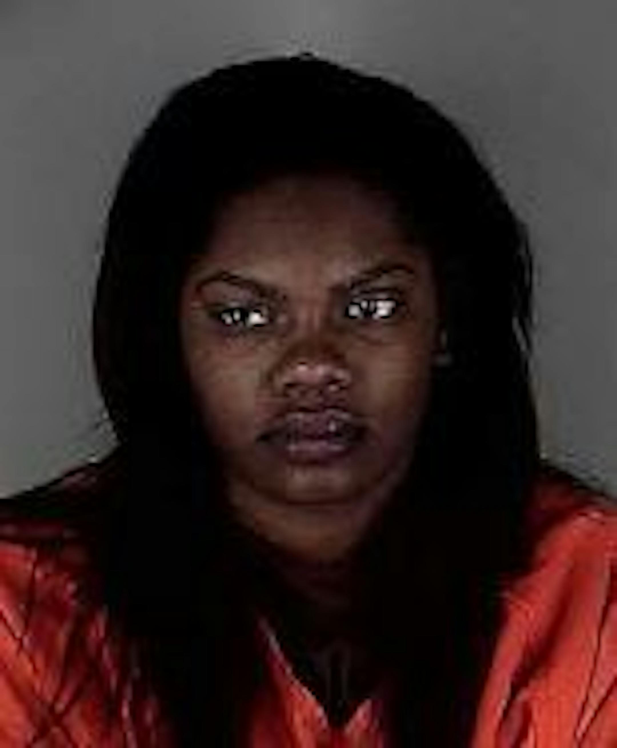 Jasmine N. Jones, charged with murder in a shooting at Augie's strip club.