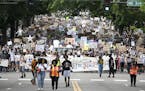 Thousands of protesters marched to Mayor Jacob Frey's house in northeast Minneapolis on Saturday, June 6, to demand the city defund the Police Departm