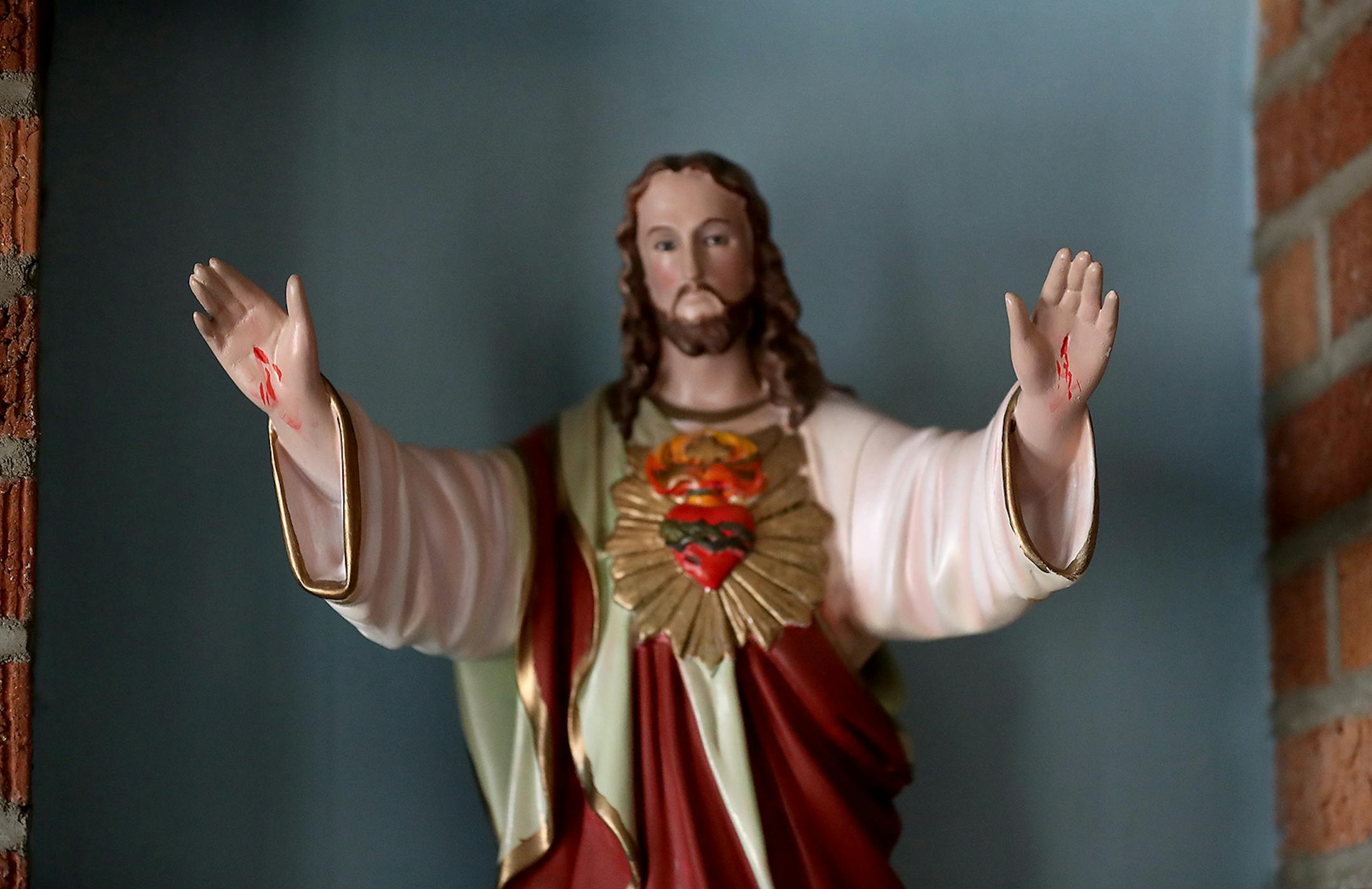 A statue of Jesus Christ is seen in the hall outside the St. Clare's Monastery Chapel Thursday, April 16, 2020, in Sauk Rapids, MN. Poor Clare nuns of St. Clare's Monastery nuns met with journalists in the monastery's parlor, the one room where outsiders have partial access to the nuns in a room divided by a metal lattice with a folding wooden divider.