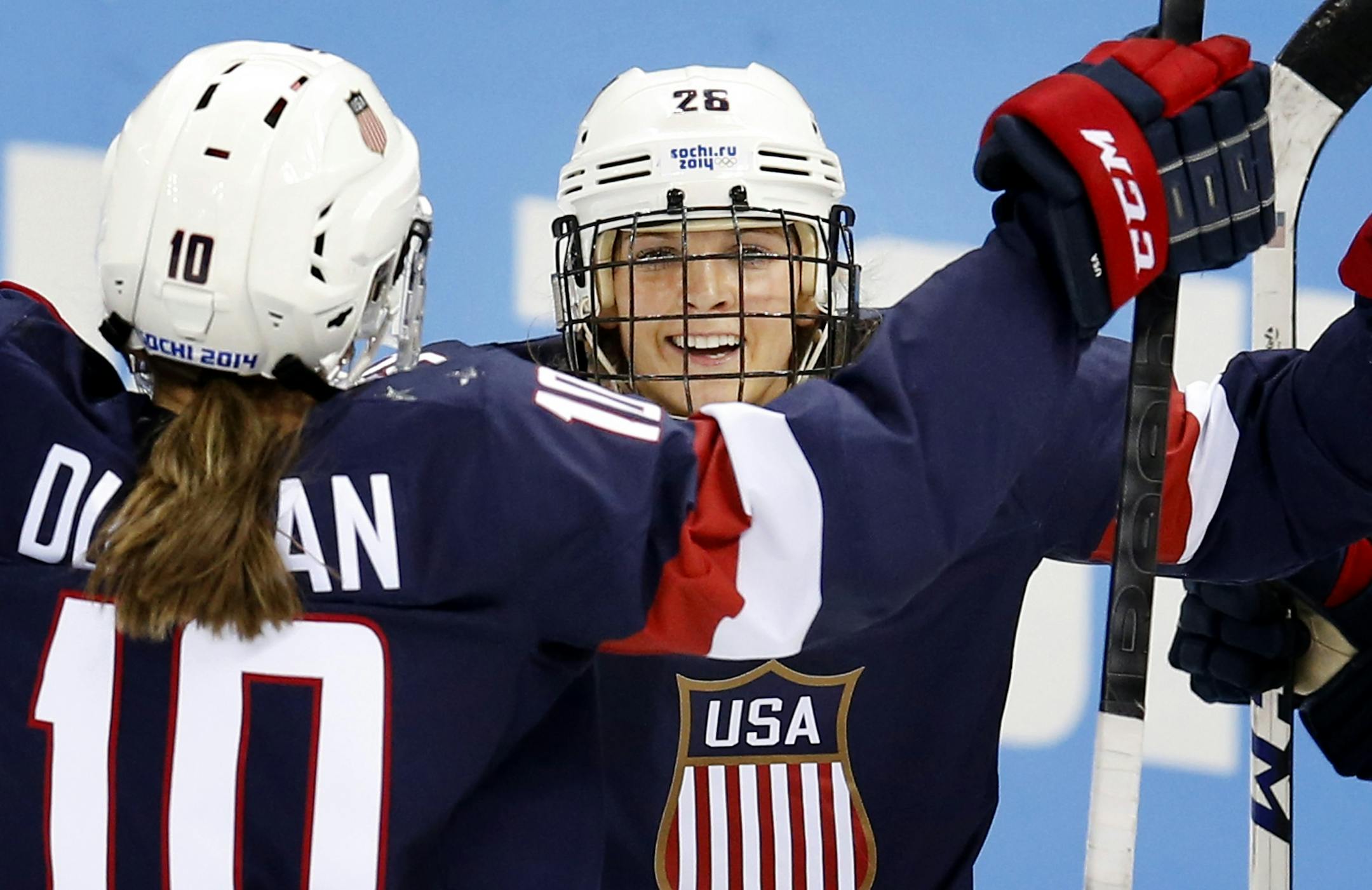 Amanda Kessel celebrated with Meghan Duggan (10) after scoring a goal in the first period. USA beat Sweden by a final score of 6-1.