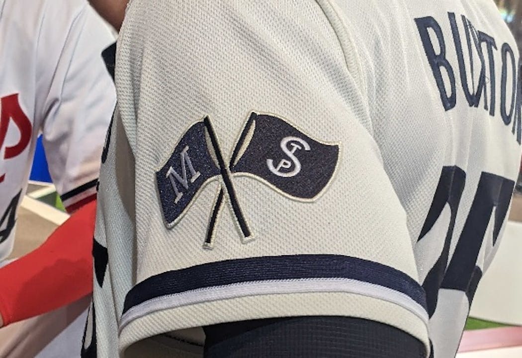The new “Twin Cities” jersey has flags on a sleeve representing Minneapolis and St. Paul.