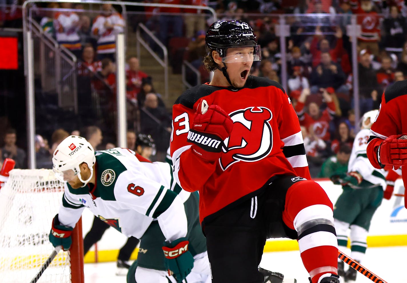 New Jersey Devils right wing Tyler Toffoli (73) reacts after scoring against the Minnesota Wild during the second period of an NHL hockey game, Sunday, Oct. 29, 2023, in Newark, N.J. (AP Photo/Noah K. Murray)