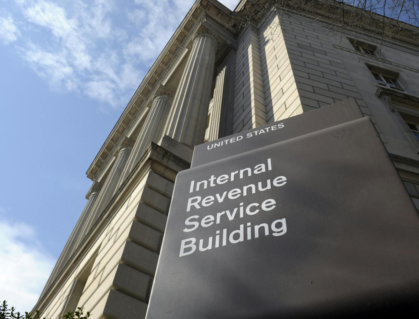 FILE - This March 22, 2013 file photo shows the exterior of the Internal Revenue Service (IRS) building in Washington. The Trump administration is lifting requirements for some tax-exempt groups to disclose the identities of their donors to federal tax authorities, announced late Monday, July 16, 2018. The change benefits groups that spend millions of dollars on political ads, such as the U.S. Chamber of Commerce and an organization tied to the billionaire Koch brothers. (AP Photo/Susan Walsh, F