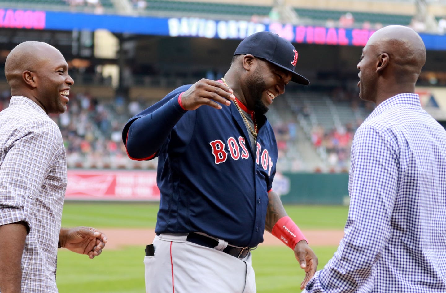 During a pre-game ceremony honoring Boston Red Sox and former Minnesota Twin David Ortiz, Ortiz is greeted by former Twin teammates LaTroy Hawkins, right, and Torii Hunter before Ortiz and Boston squared off with the Minnesota Twins Friday, June 10, 2016, at Target Field in Minneapolis, MN.