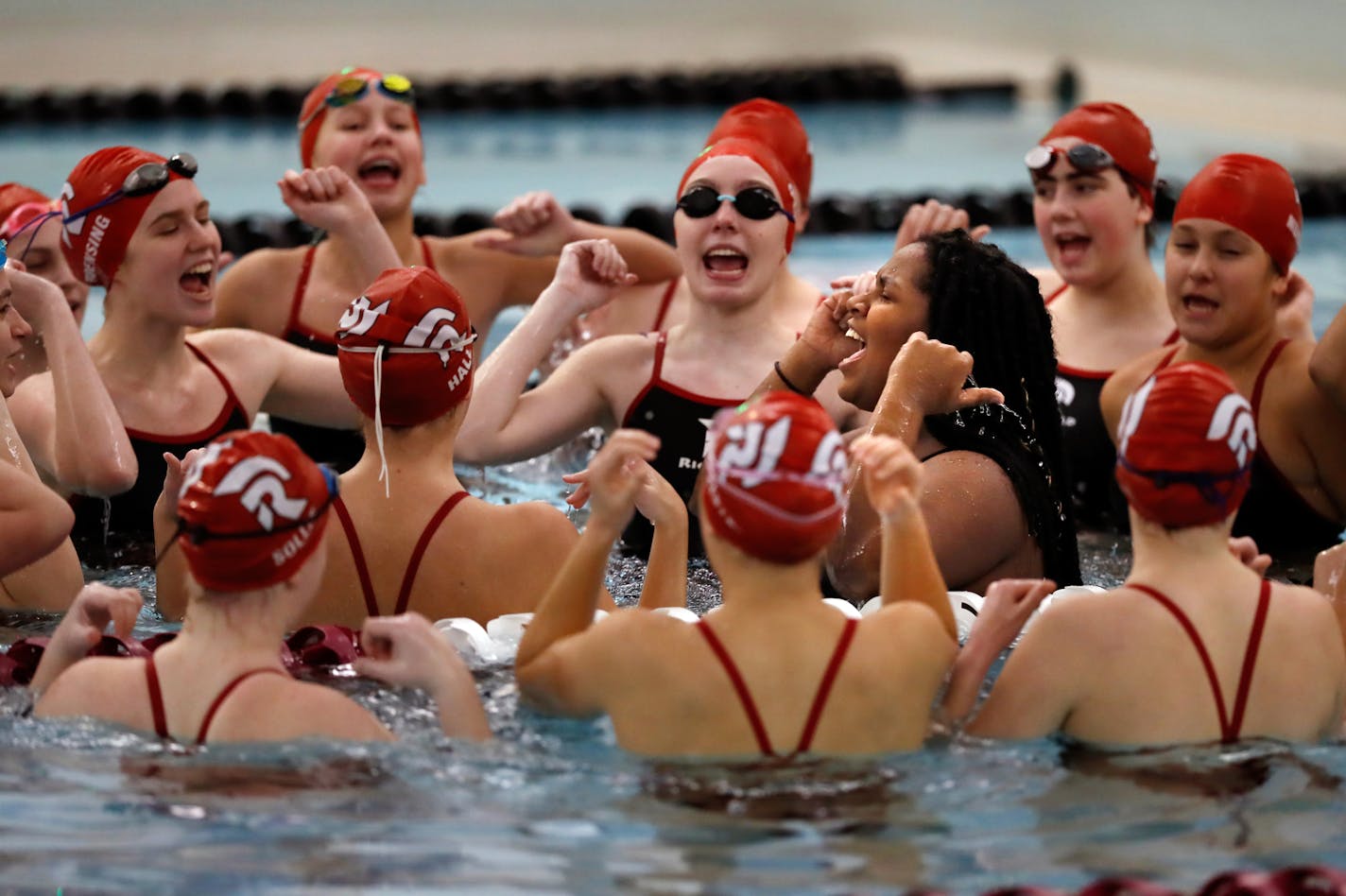 Kanani Ali led her teammates in the "my back aches, my caps too tight" cheer before the friendly meet with the boys' team.] Before AFM was a widely known but rare cause of paralysis in children, Kanani Ali suffered the disorder in 2016 and temporarily lost function in her legs. The Richfield high school senior worked back to the point that she captained her swim team this fall, and wants her experience to offer hope to other children trying to regain lost mobility from this disorder. Richard Tso