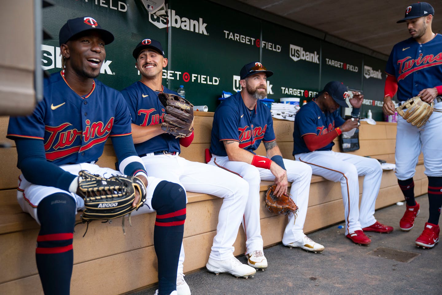 Minnesota Twins players joke around in the dugout ahead of their game against the Toronto Blue Jays Friday, August 5, 2022 at Target Field in Minneapolis. ]