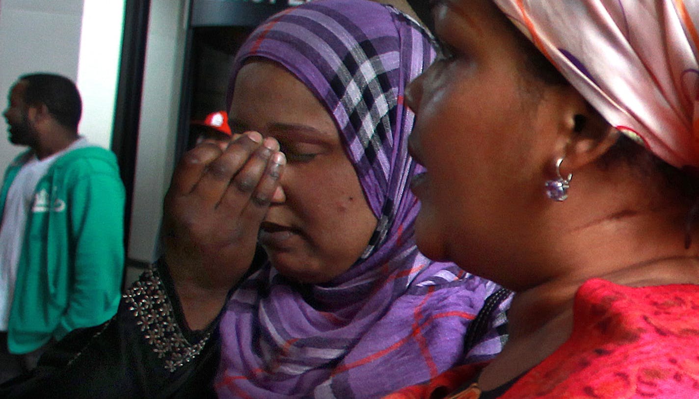 Chaltu Nur, wife of murder victim Anwar Mohammed, and Jamiila Ahmed, spoke to reporters following the first-degree murder conviction of Mahdi Hassan Ali for the three murders that occurred during a robbery attempt at a Minneapolis meat market in January, 2010. Jamiila Ahmed was in the store at the time of the crime.