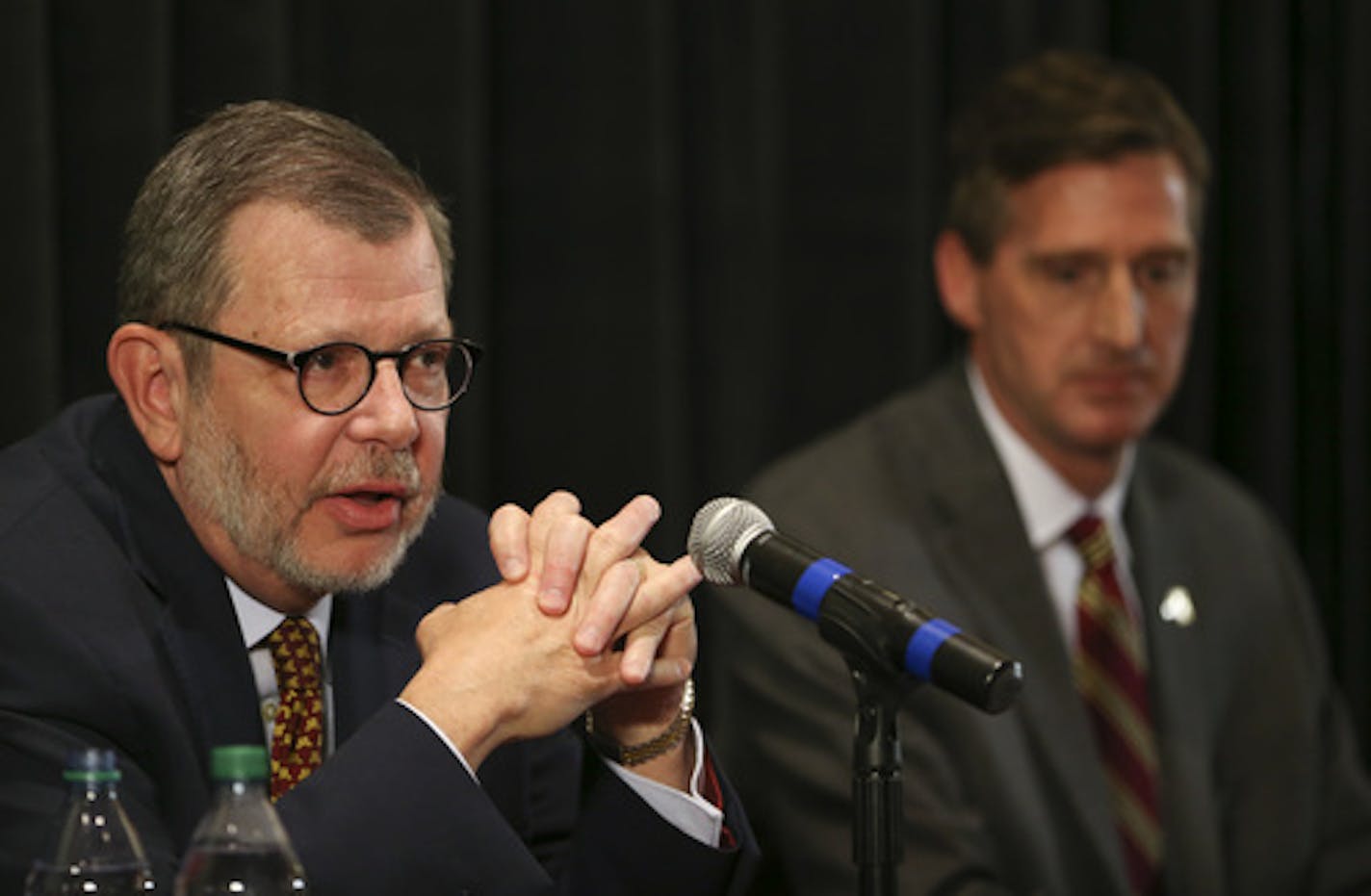 University of Minnesota President Eric Kayler, foreground, with new U of M Athletic Director Mark Coyle at the news conference where he was introduced Wednesday afternoon at TCF Bank Stadium. ] JEFF WHEELER &#x2022; jeff.wheeler@startribune.com Former Syracuse Athletic Director Mark Coyle was introduced as the new AD at the University of Minnesota at a news conference Wednesday afternoon, May 11, 2016 at the M Club room at TCF Bank Stadium