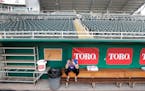 Twins catcher Mitch Garver talks on his phone in an empty Hammond Stadium on Thursday in Fort Myers. Major League Baseball has suspended the rest of i
