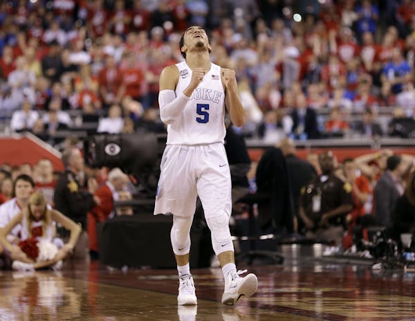 Duke's Tyus Jones reacts during the second half of the NCAA Final Four college basketball tournament championship game against Wisconsin Monday, April