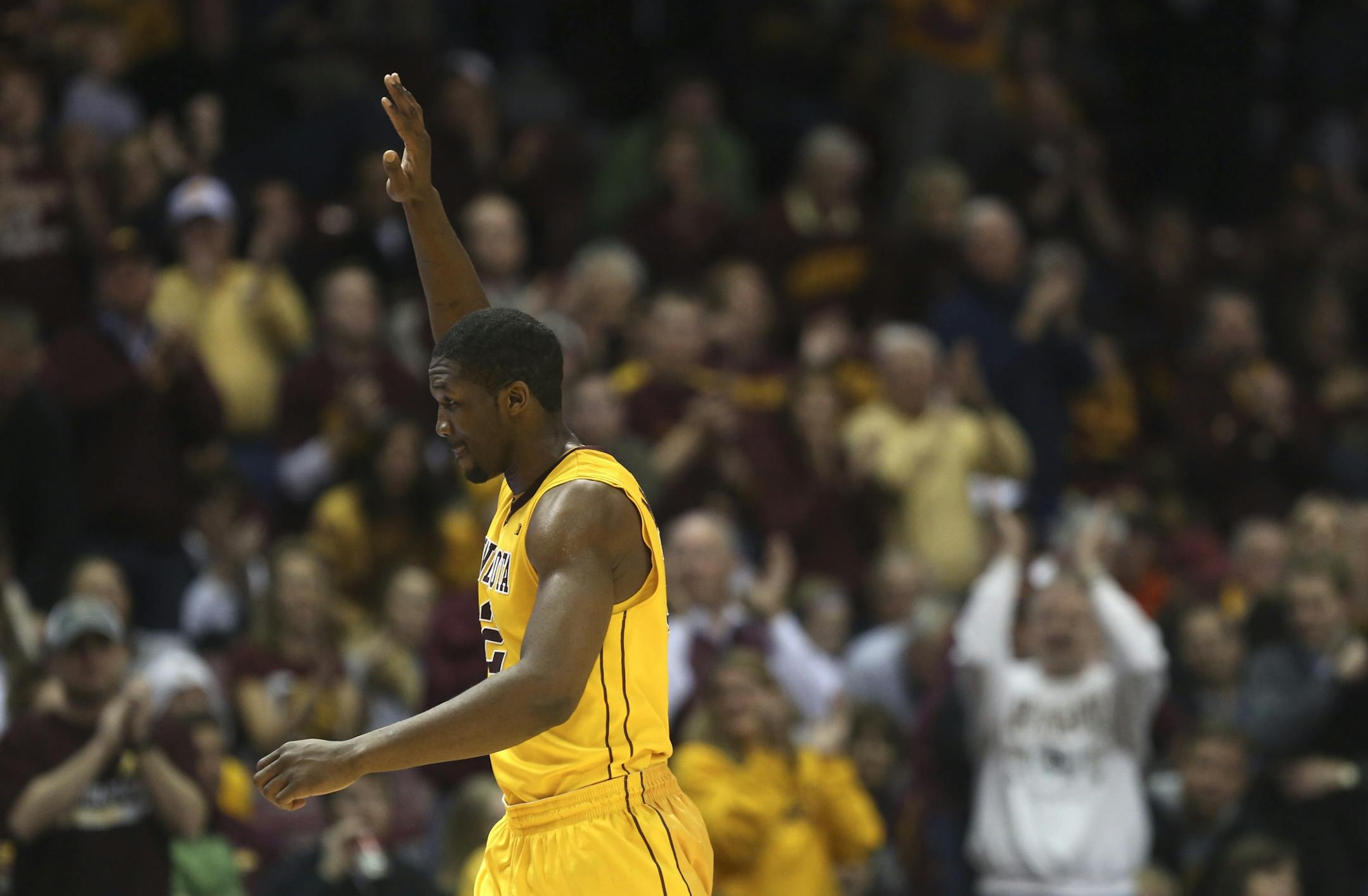 Gopher's Trevor Mbakwe waved to the crowd after receving a standing ovation after being taken out near the end of the second half at Williams Arena in Minneapolis, Min., Saturday, March 2, 2013. Gophers won 73-44.