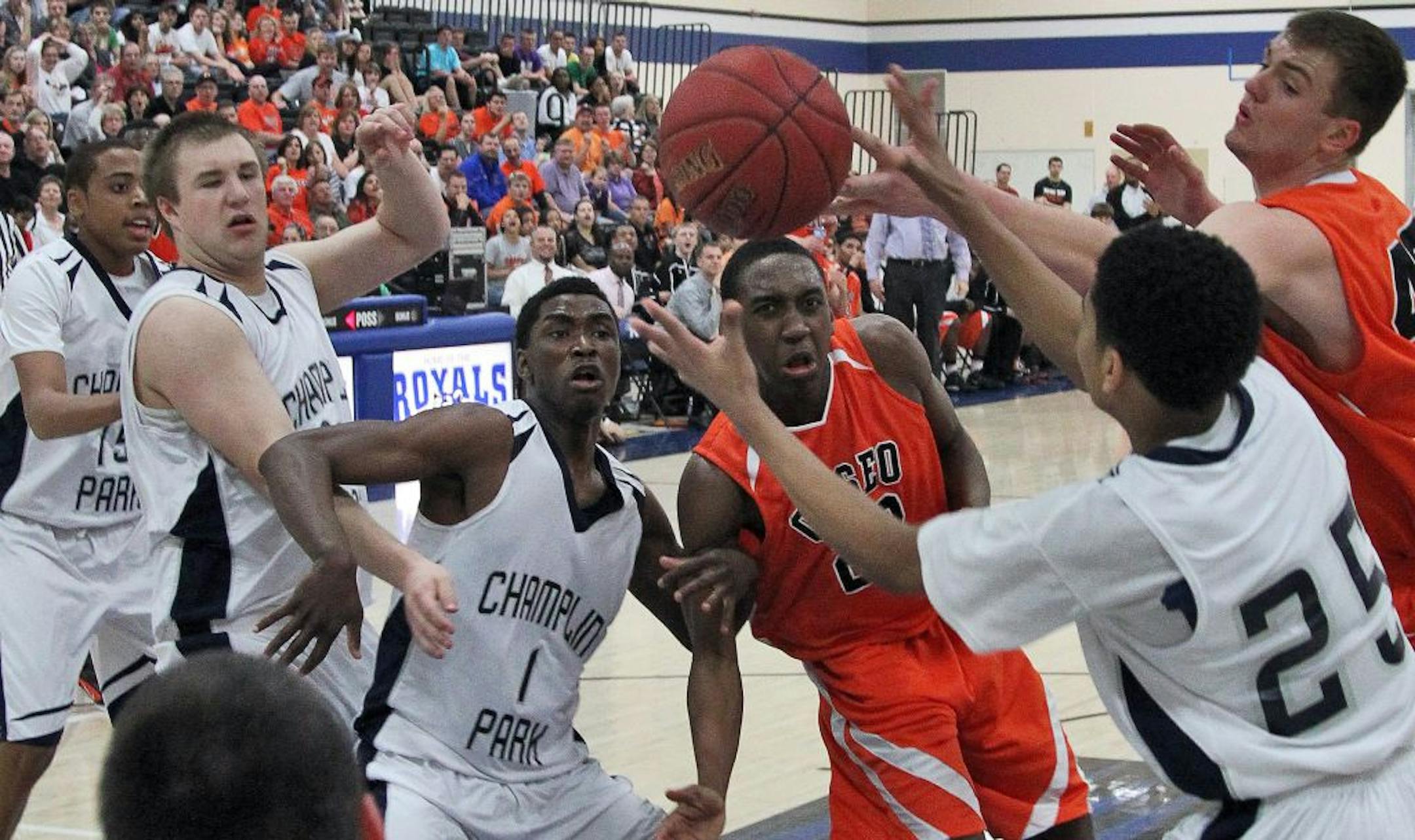 Osseo and Champlin Park battled in the Class 4A, Section 5 title game, which the Orioles won 50-40. Osseo's players learned a lesson in a loss to Champlin Park earlier in the season. "We were really cocky," guard Bridgeport Tusler said. "The fact that we lost was probably the best thing that could've happened to us. It opened up our eyes."